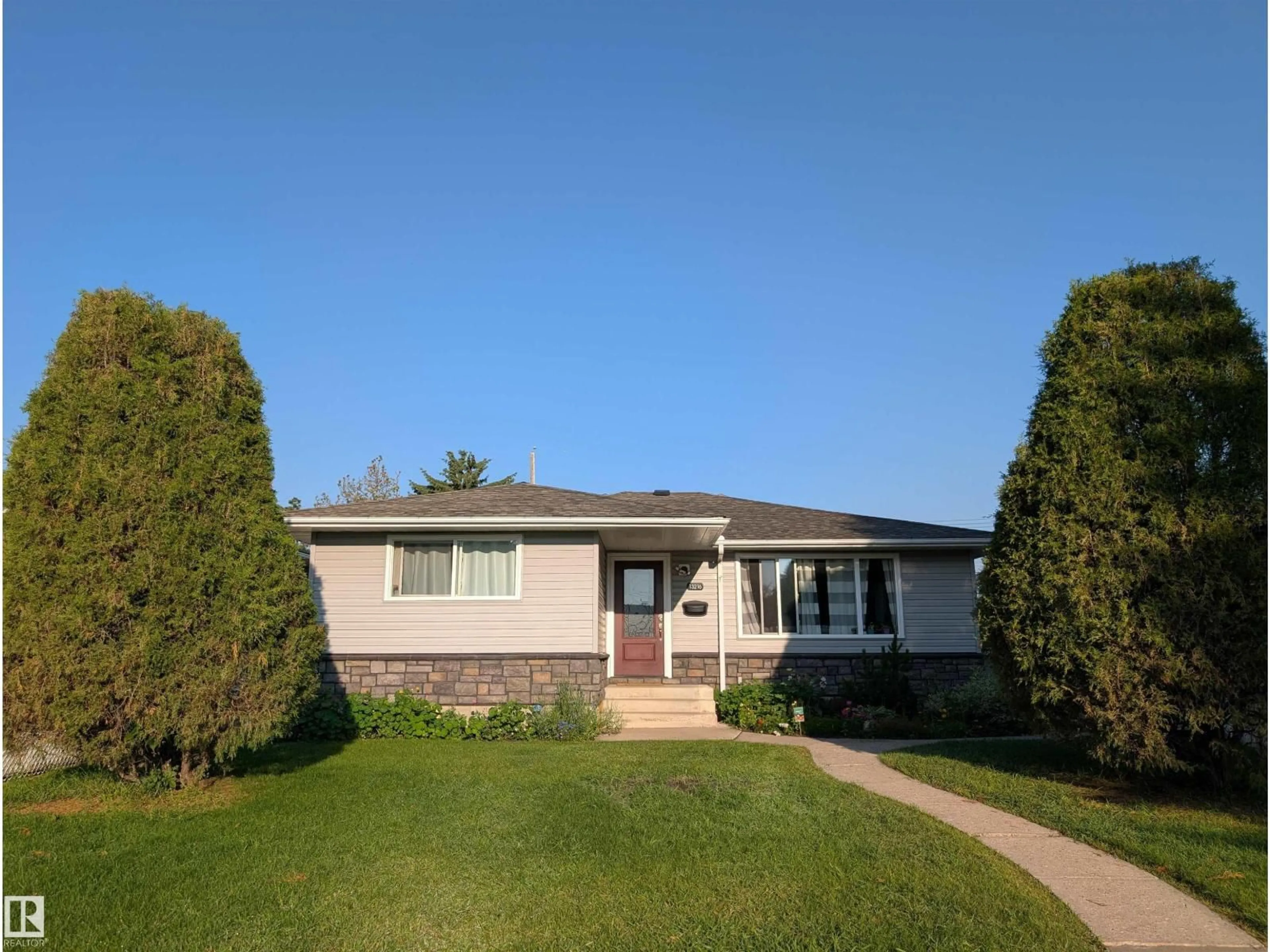 Home with vinyl exterior material, street for NW - 13216 117 ST, Edmonton Alberta T5E5K2