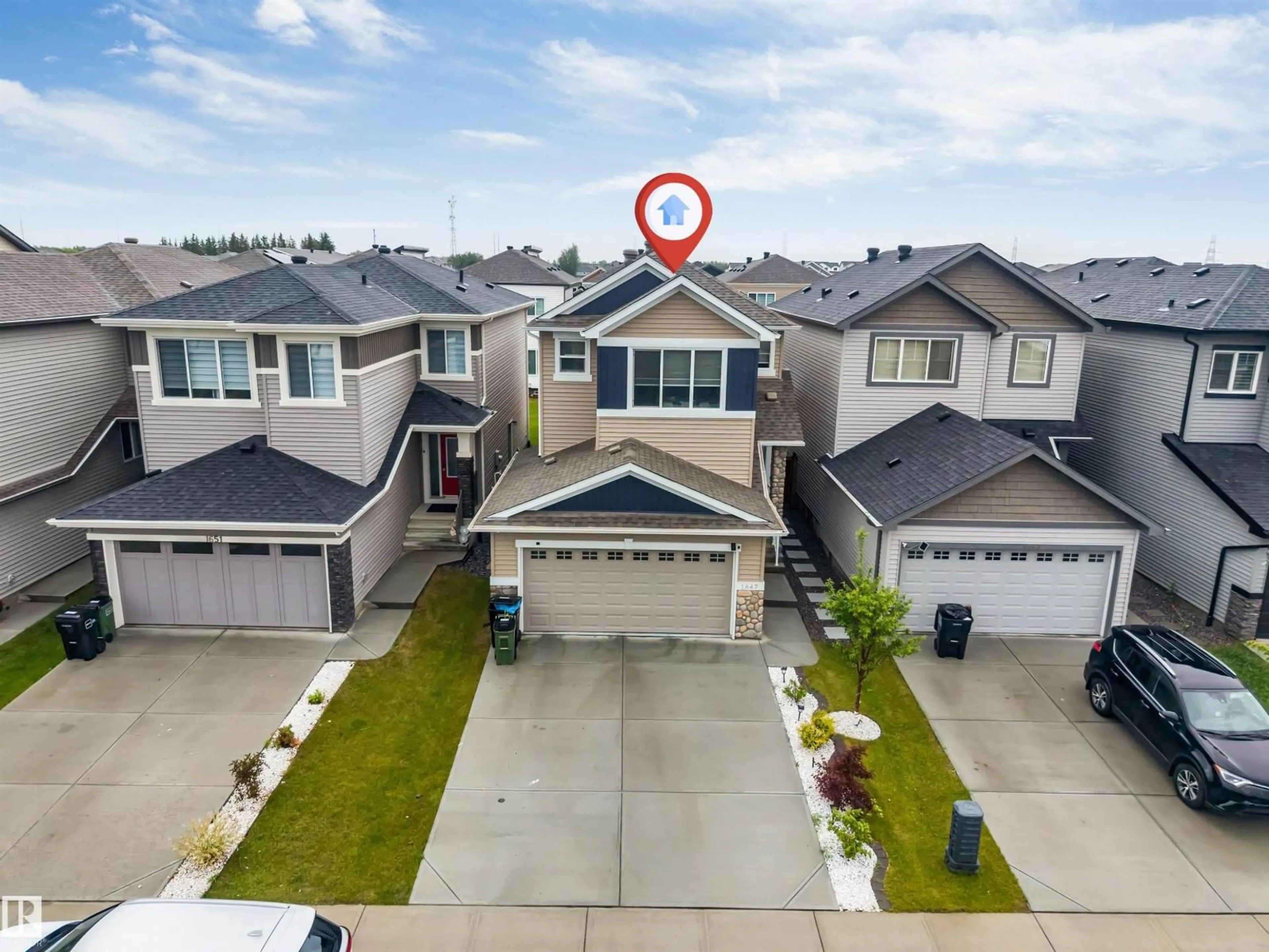 A pic from outside/outdoor area/front of a property/back of a property/a pic from drone, street for NW - 1647 13 ST, Edmonton Alberta T6T2N5