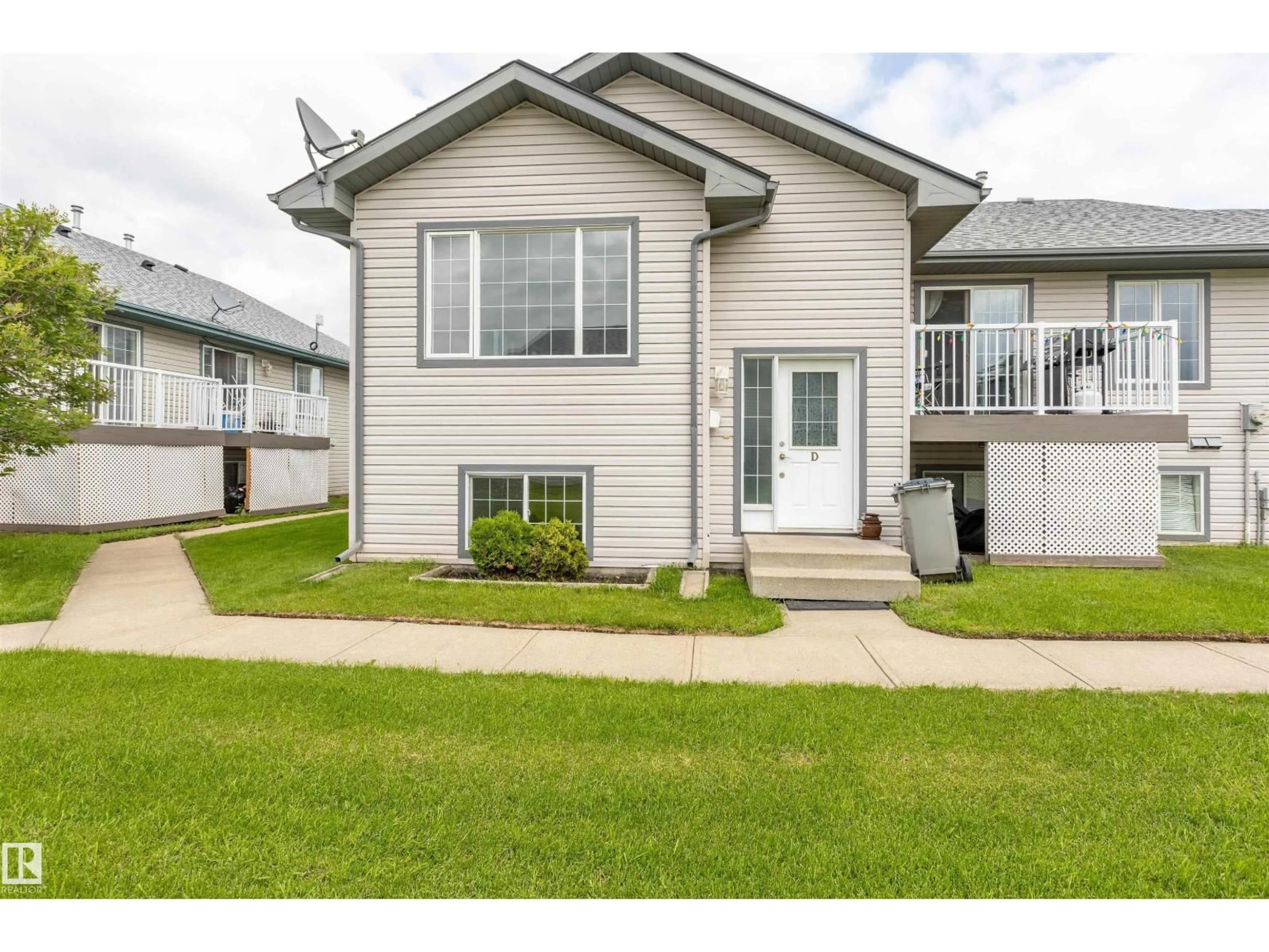 Home with vinyl exterior material, street for D - 10102 103 ST, Morinville Alberta T8R1T4