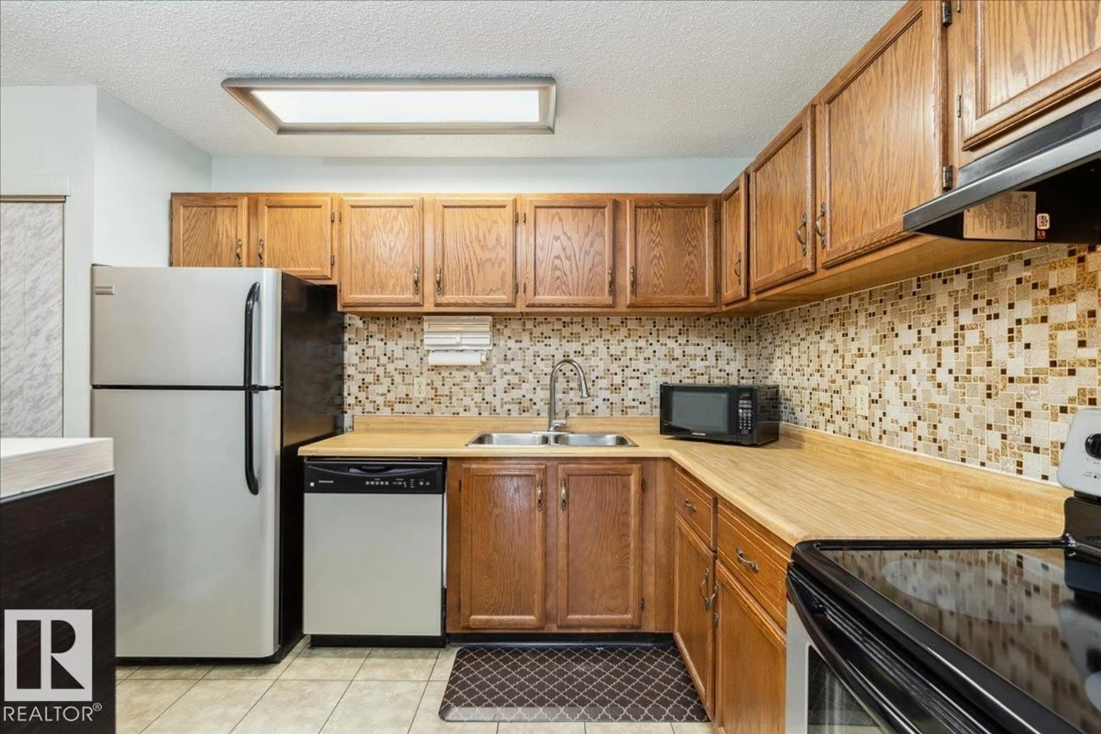 Standard kitchen, unknown for #112 - 2904 139 AV, Edmonton Alberta T5Y1P7