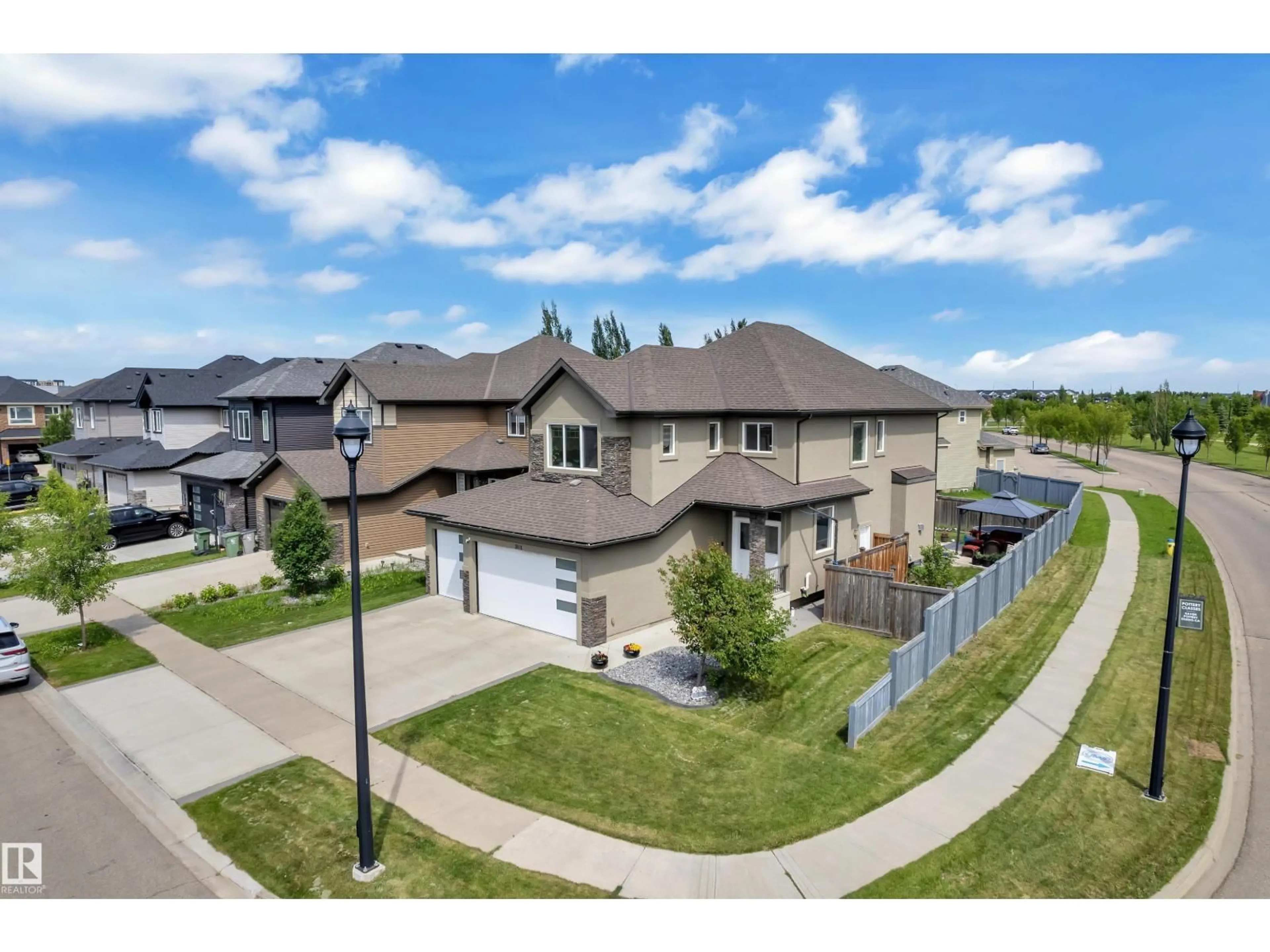 A pic from outside/outdoor area/front of a property/back of a property/a pic from drone, street for 3001 55 ST, Beaumont Alberta T4X1C4