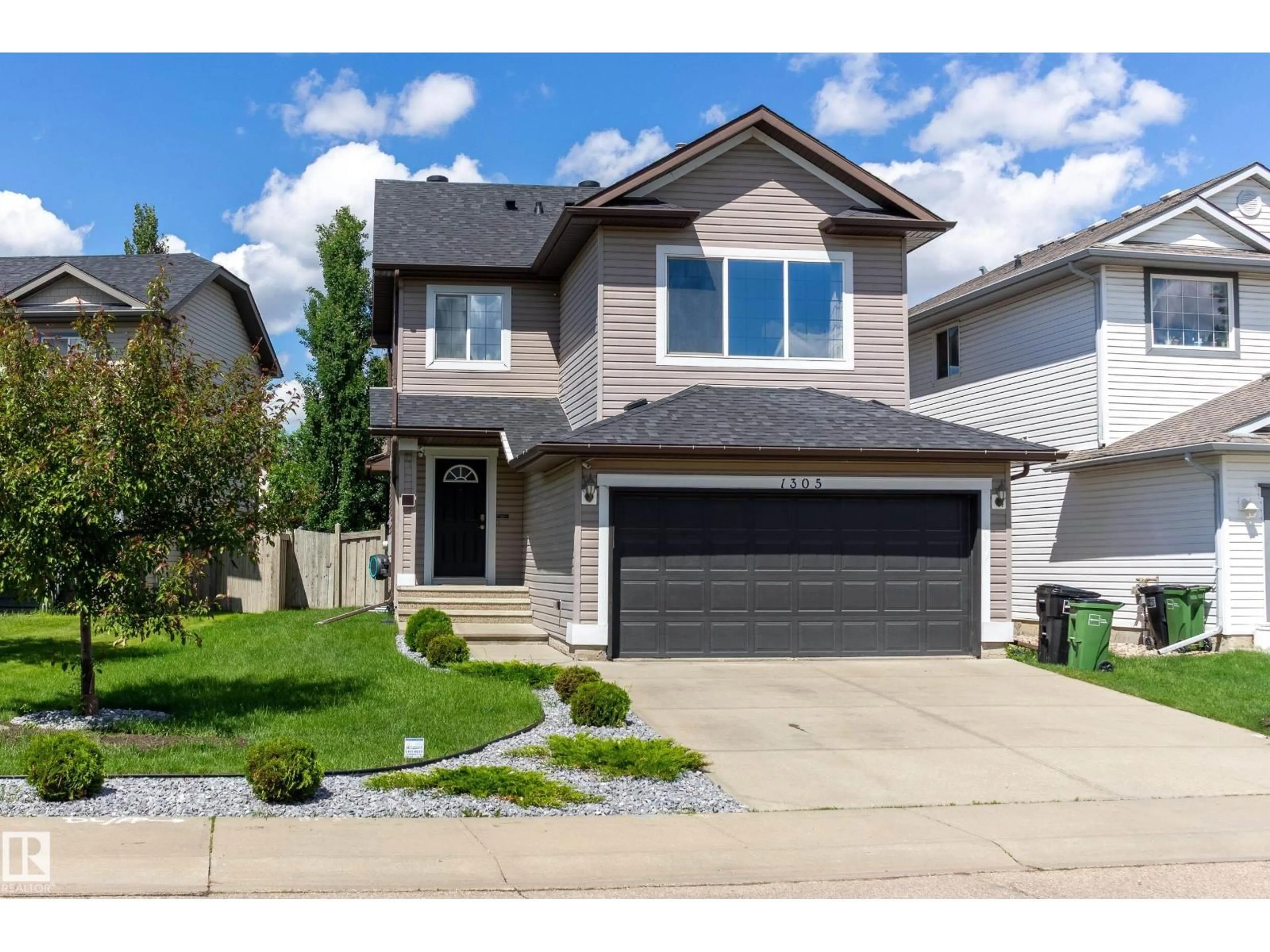 Home with vinyl exterior material, street for 1305 MCALLISTER WY, Edmonton Alberta T6W1R5