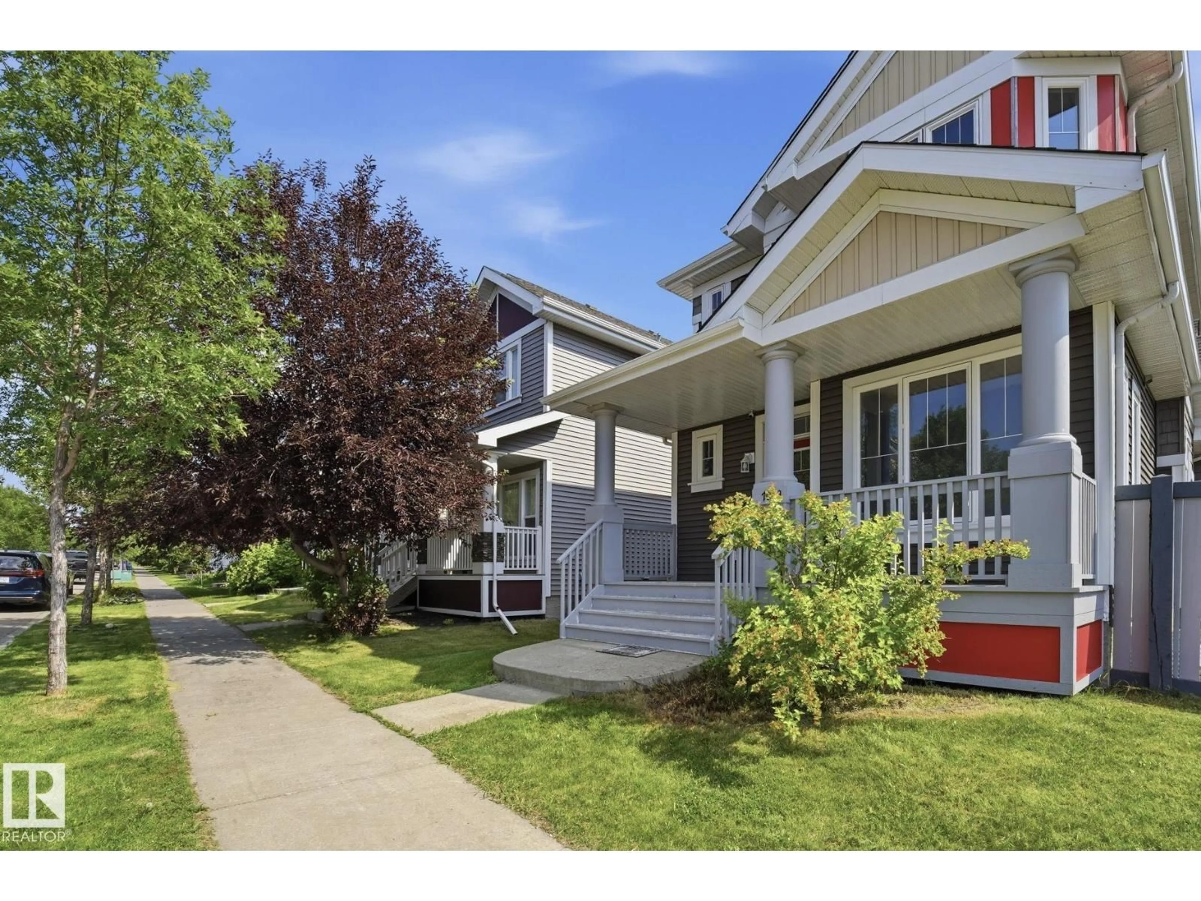 Home with vinyl exterior material, street for SW - 7043 22 AV, Edmonton Alberta T6X0T8
