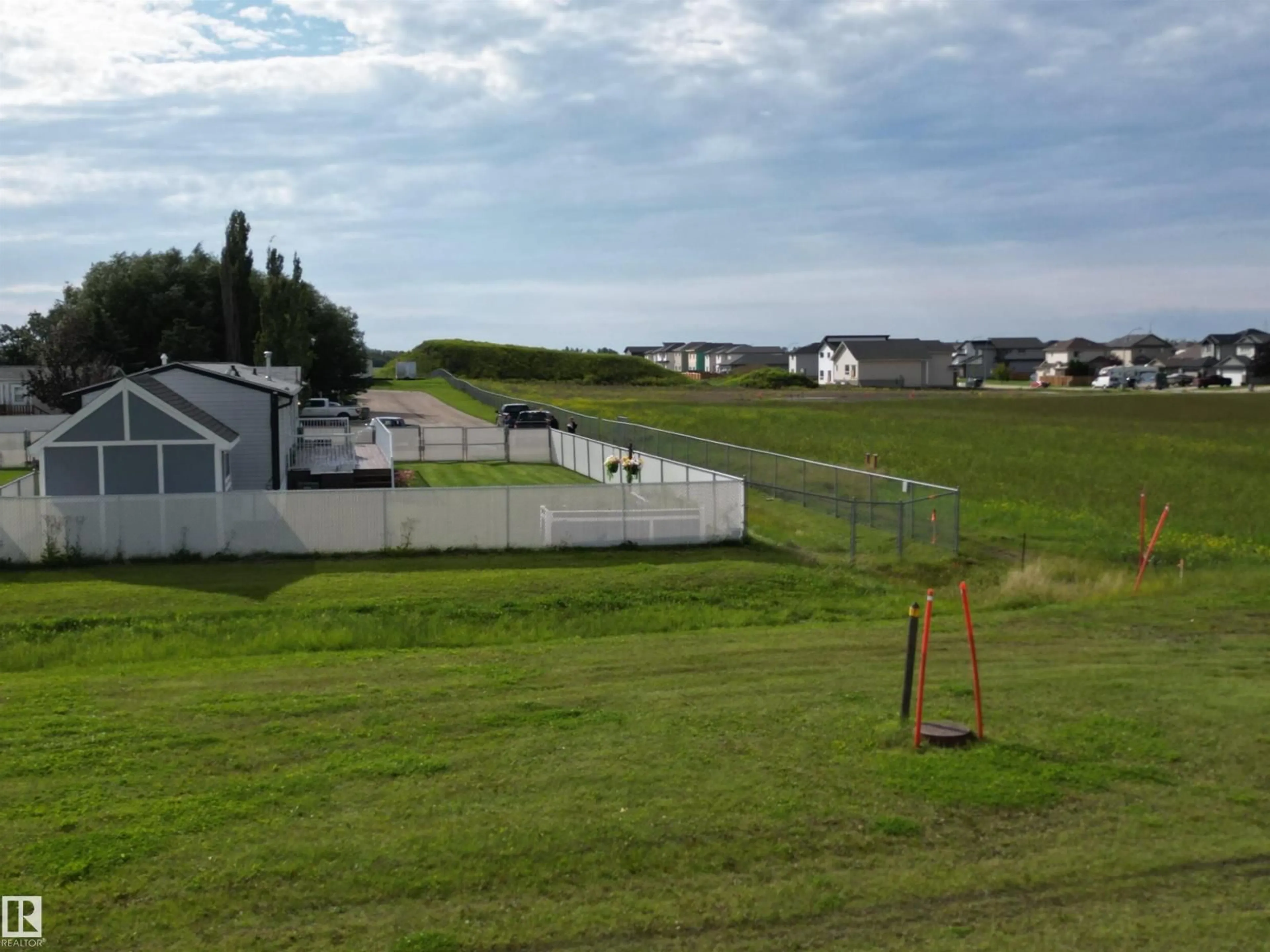 A pic from outside/outdoor area/front of a property/back of a property/a pic from drone, unknown for 41- - 5220 44 AV, Calmar Alberta T0C0V0