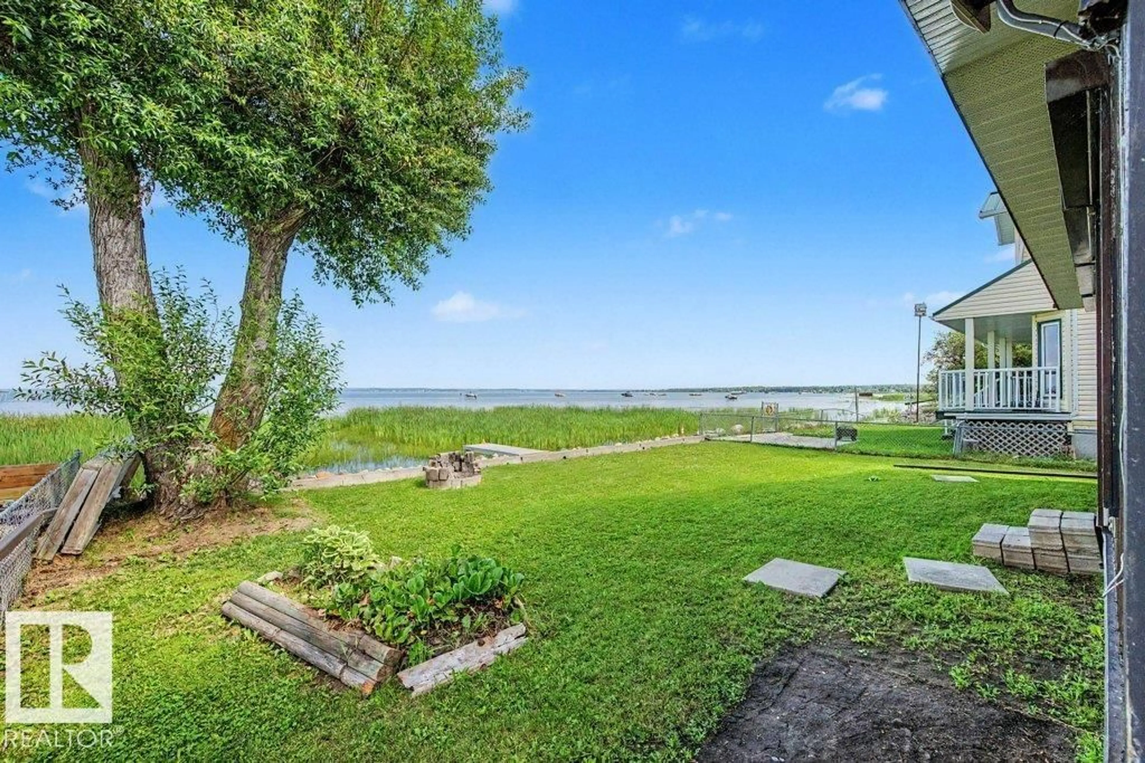 Patio, water/lake/river/ocean view for 5807 51 AV, Rural Lac Ste. Anne County Alberta T0E0A0