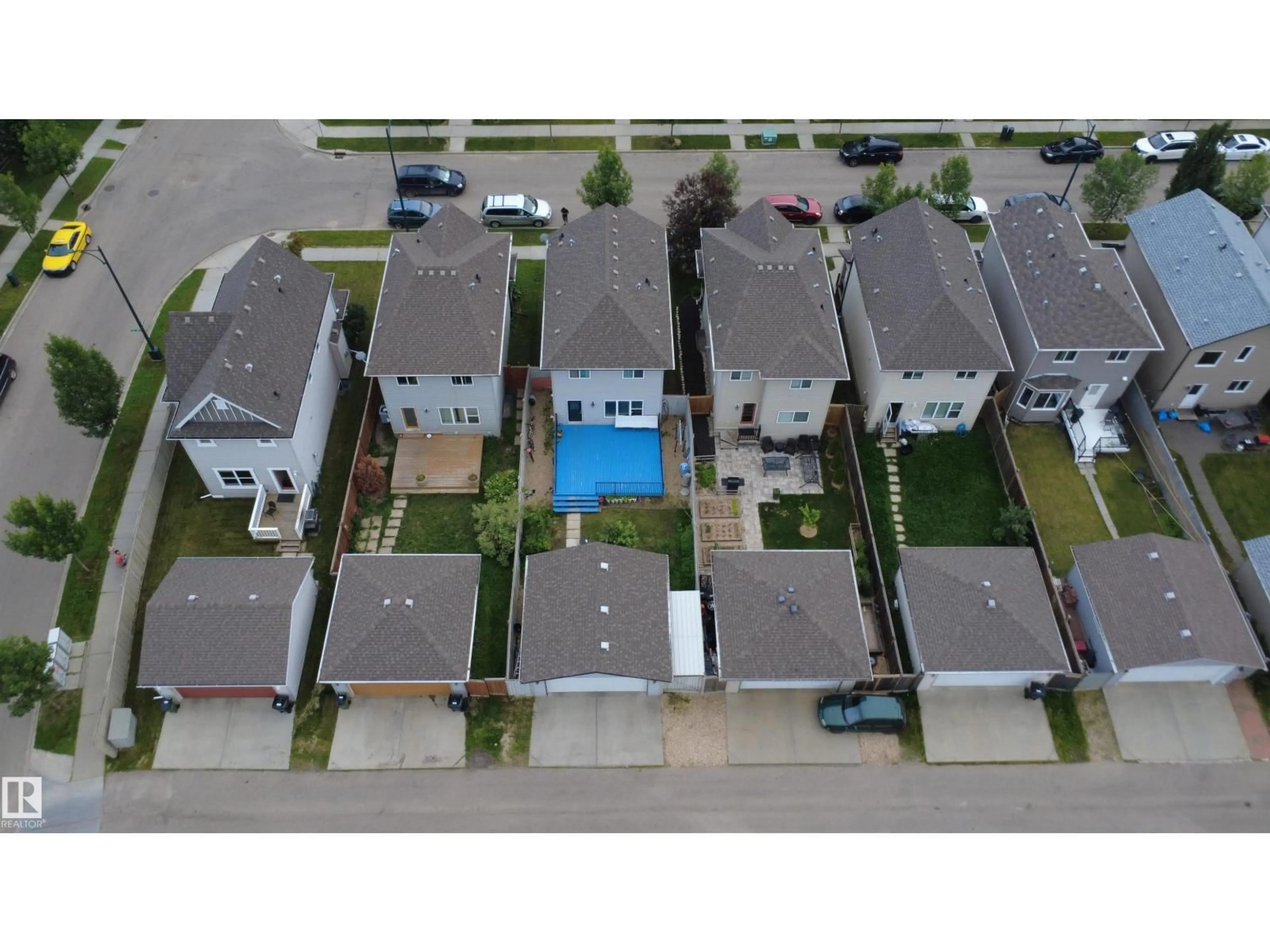 A pic from outside/outdoor area/front of a property/back of a property/a pic from drone, street for 1528 35 AV, Edmonton Alberta T6T0M9