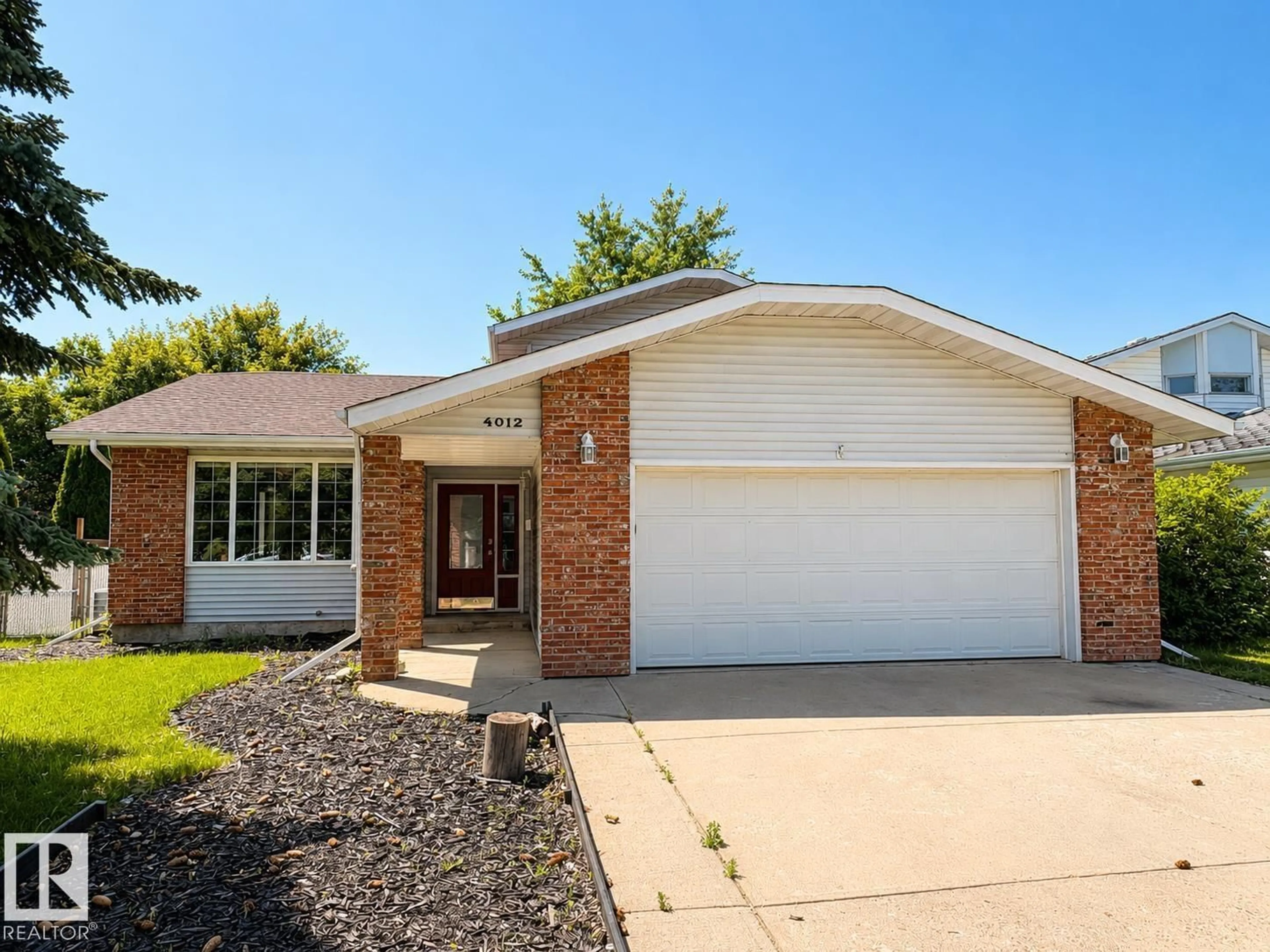 Home with brick exterior material, street for 4012 41 AV, Bonnyville Town Alberta T9N1T7