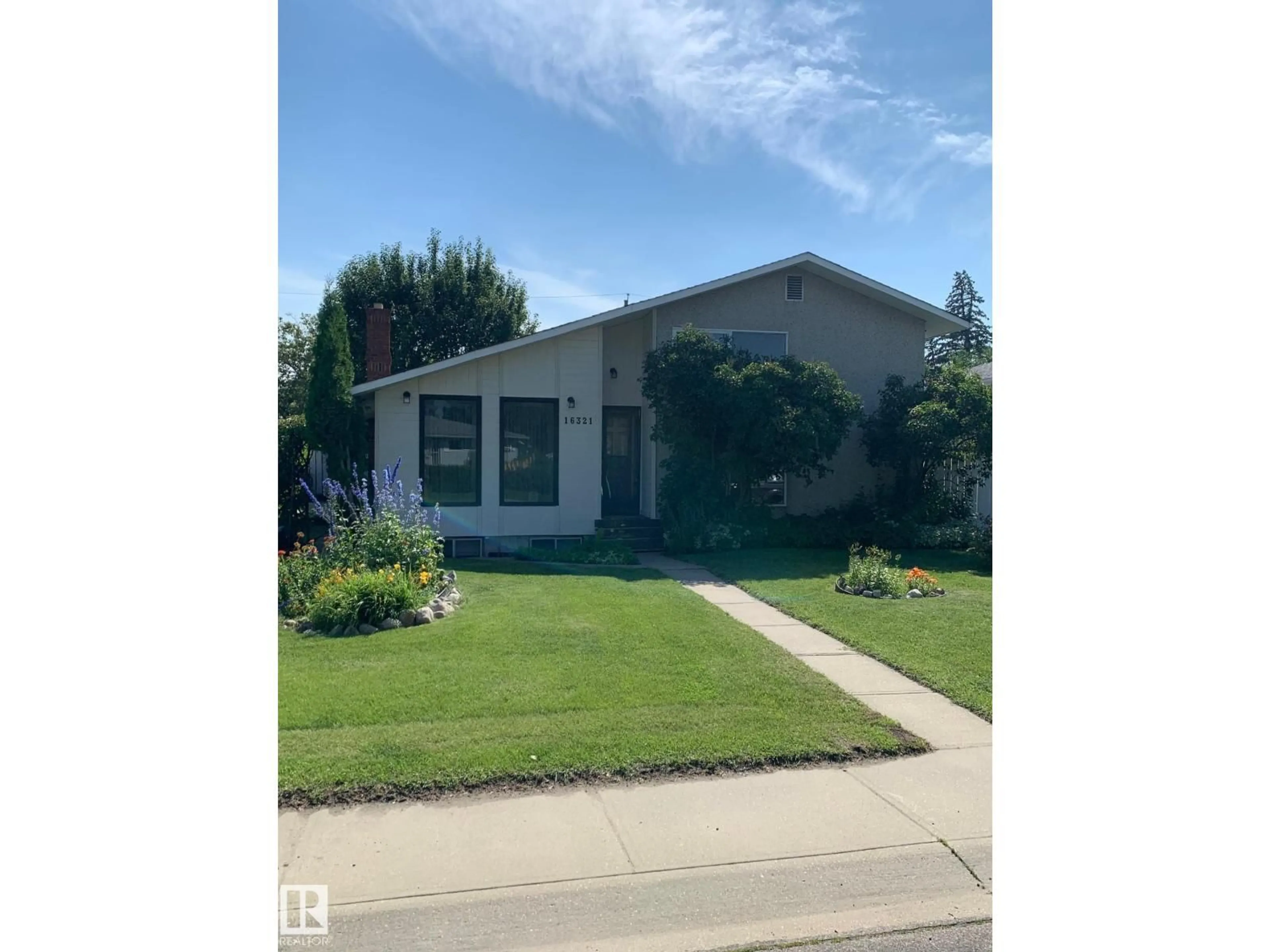 Home with vinyl exterior material, street for 16321 109A AVE AVE, Edmonton Alberta T5P1C5