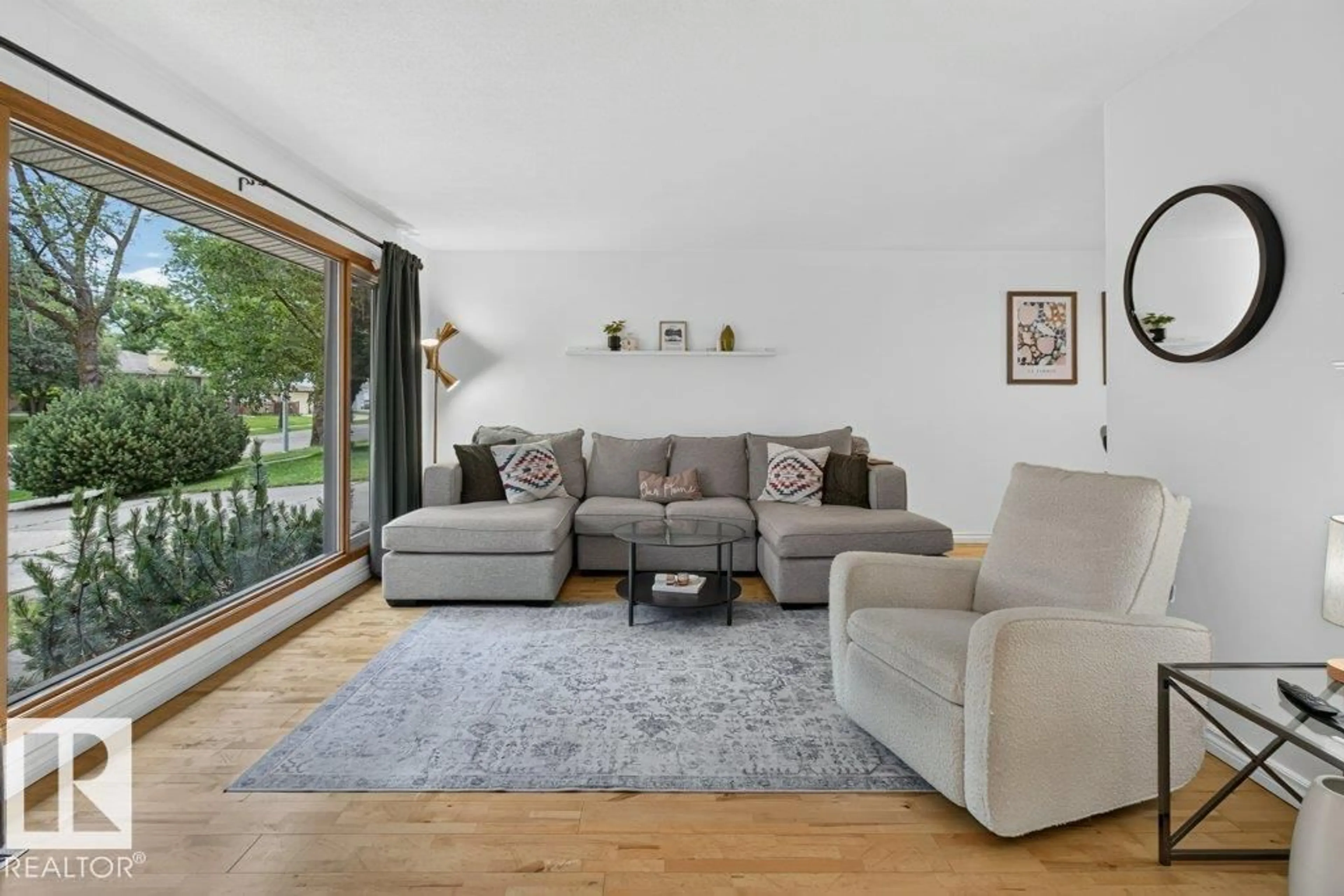 Living room with furniture, wood/laminate floor for 55 LAMBERT CR, St. Albert Alberta T8N1M3