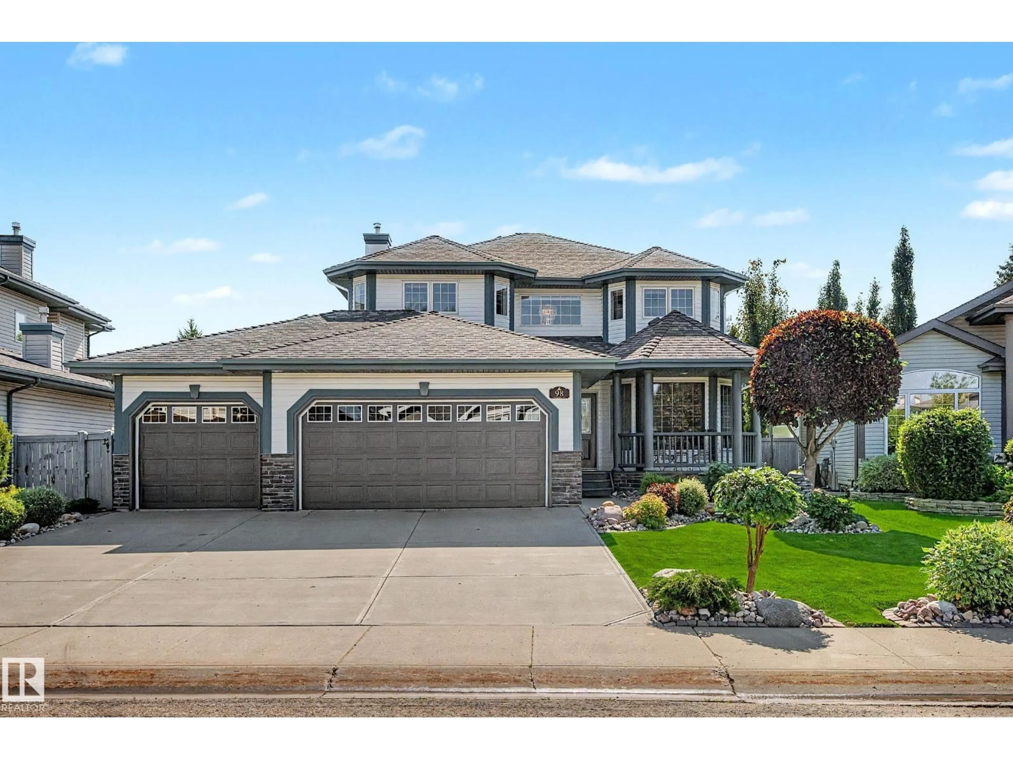 Home with vinyl exterior material, street for 98 HIGHLAND CL, Sherwood Park Alberta T8A6C5