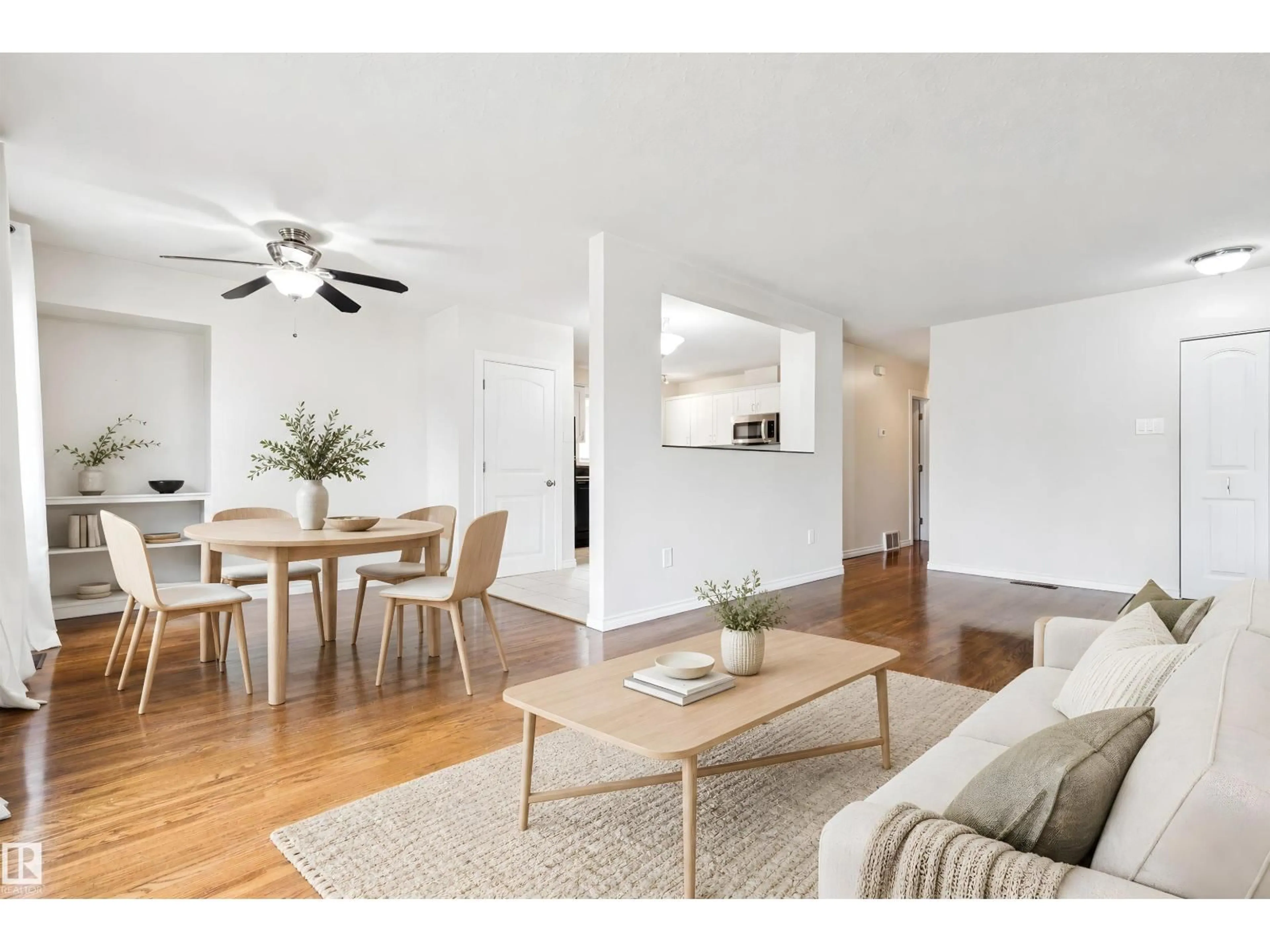 Living room with furniture, wood/laminate floor for NW - 8709 164A ST, Edmonton Alberta T5R2R2