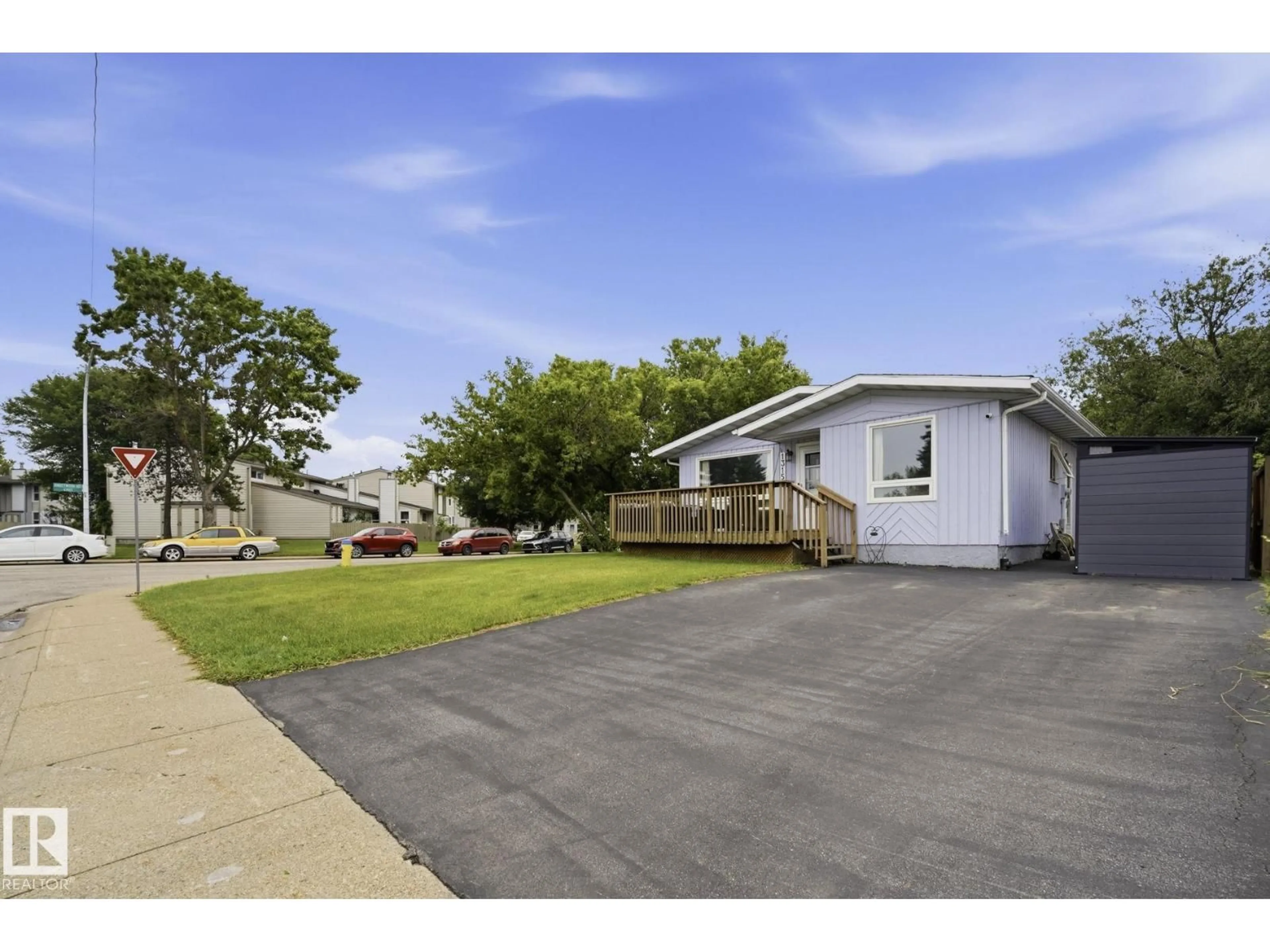 A pic from outside/outdoor area/front of a property/back of a property/a pic from drone, street for 1315 KNOTTWOOD RD, Edmonton Alberta T6K2K5