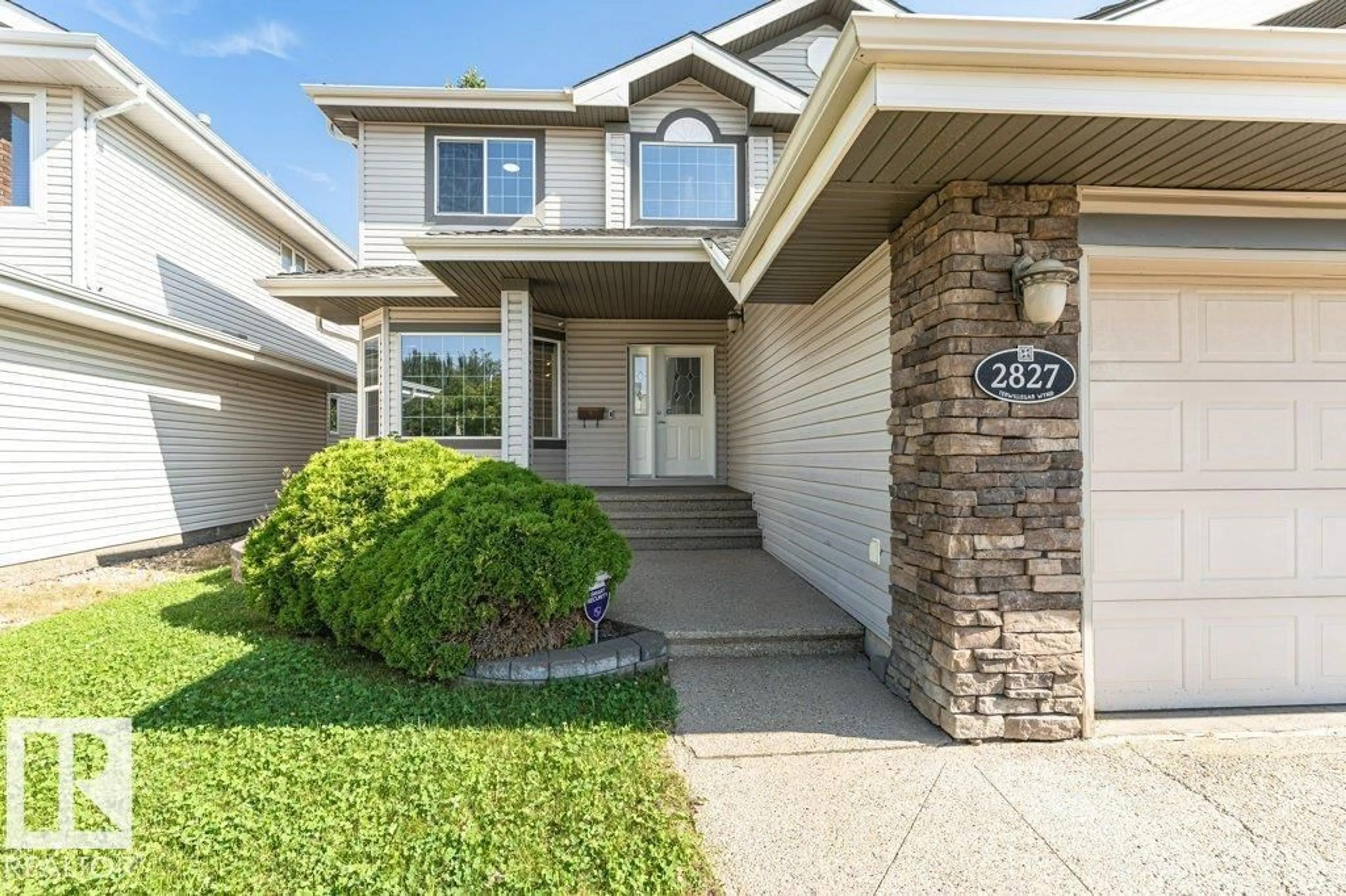 Home with vinyl exterior material, street for 2827 TERWILLEGAR WD, Edmonton Alberta T6R3R8