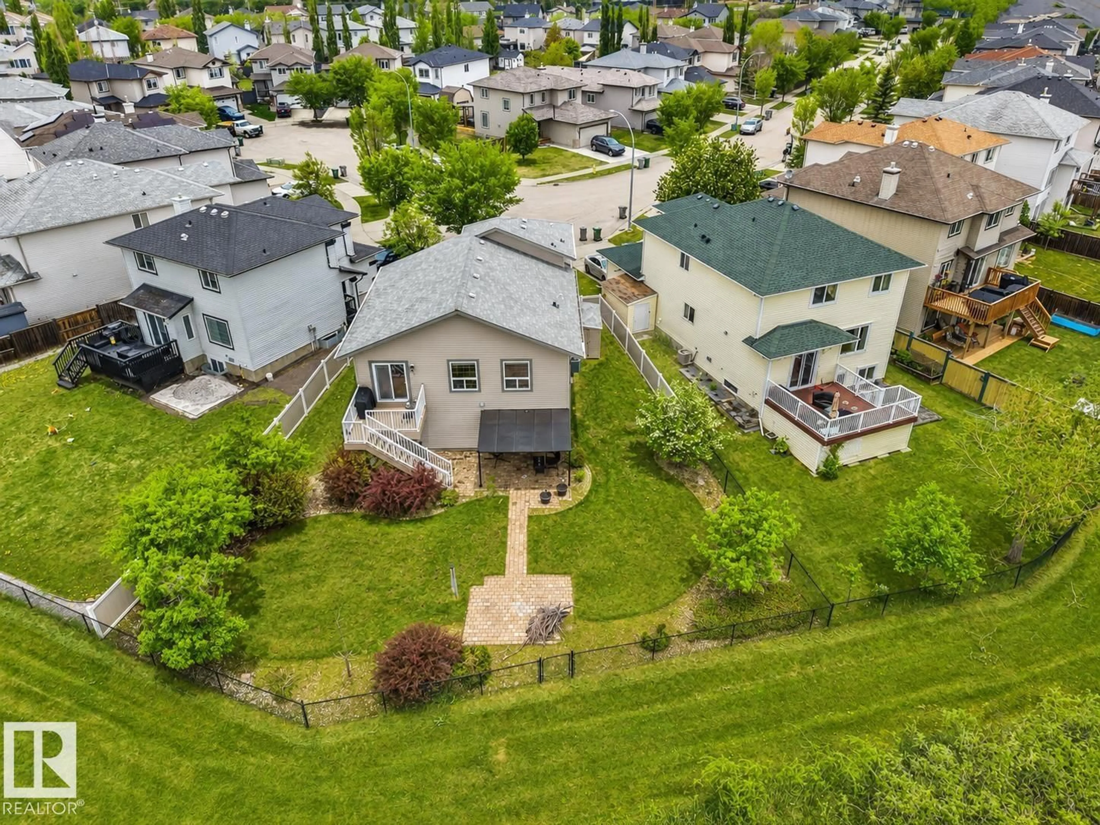 A pic from outside/outdoor area/front of a property/back of a property/a pic from drone, street for 3211 47 ST, Beaumont Alberta T4X0B7