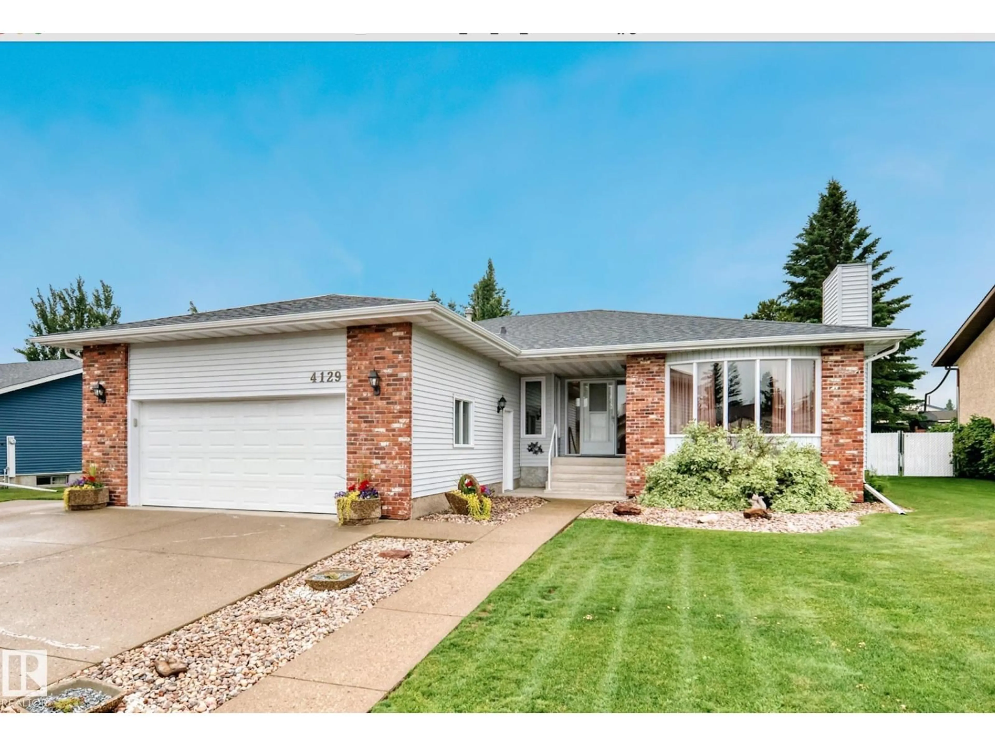 Home with brick exterior material, street for 4129 43B AV, Leduc Alberta T9E4T6