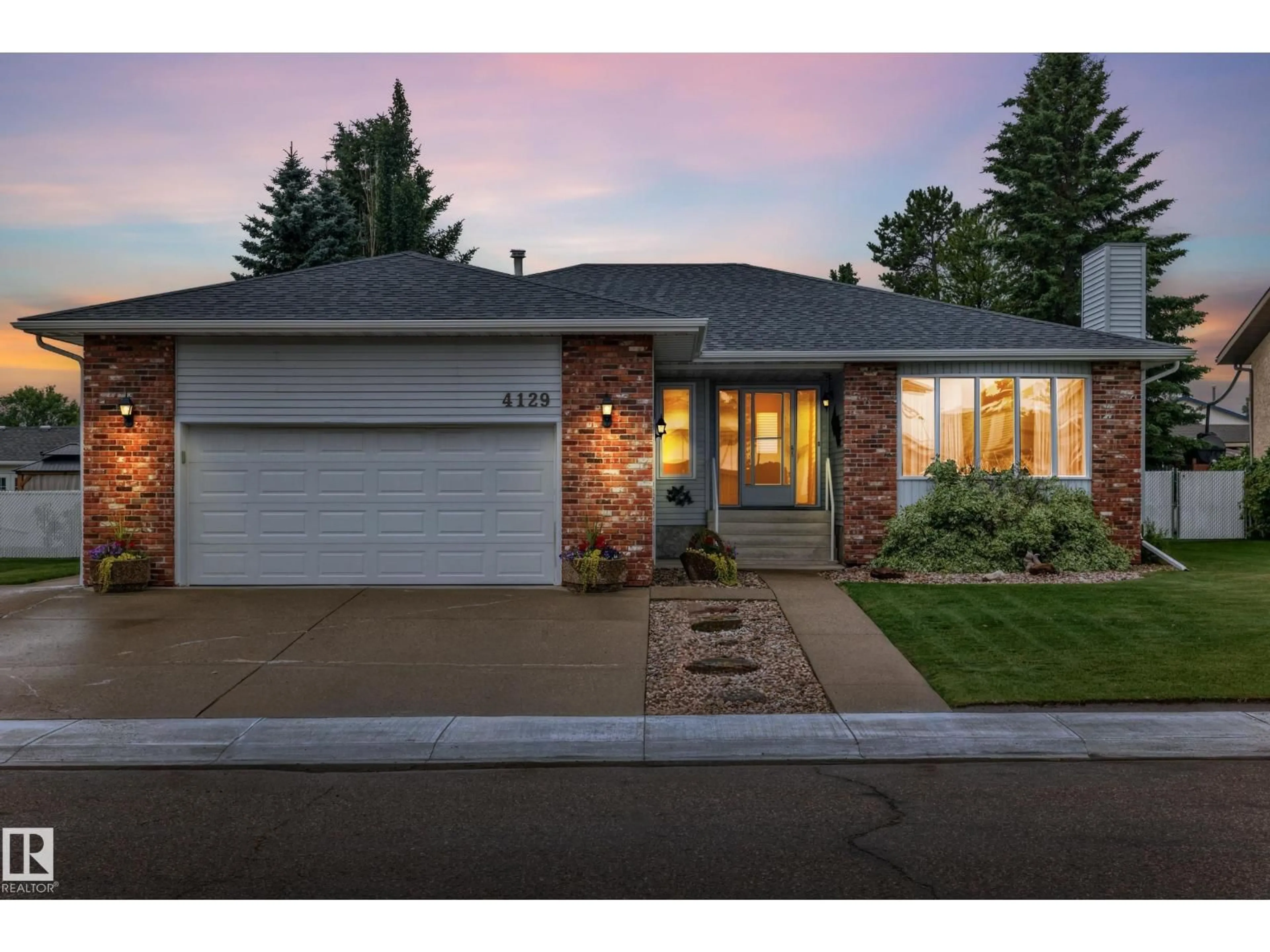 Home with brick exterior material, street for 4129 43B AV, Leduc Alberta T9E4T6