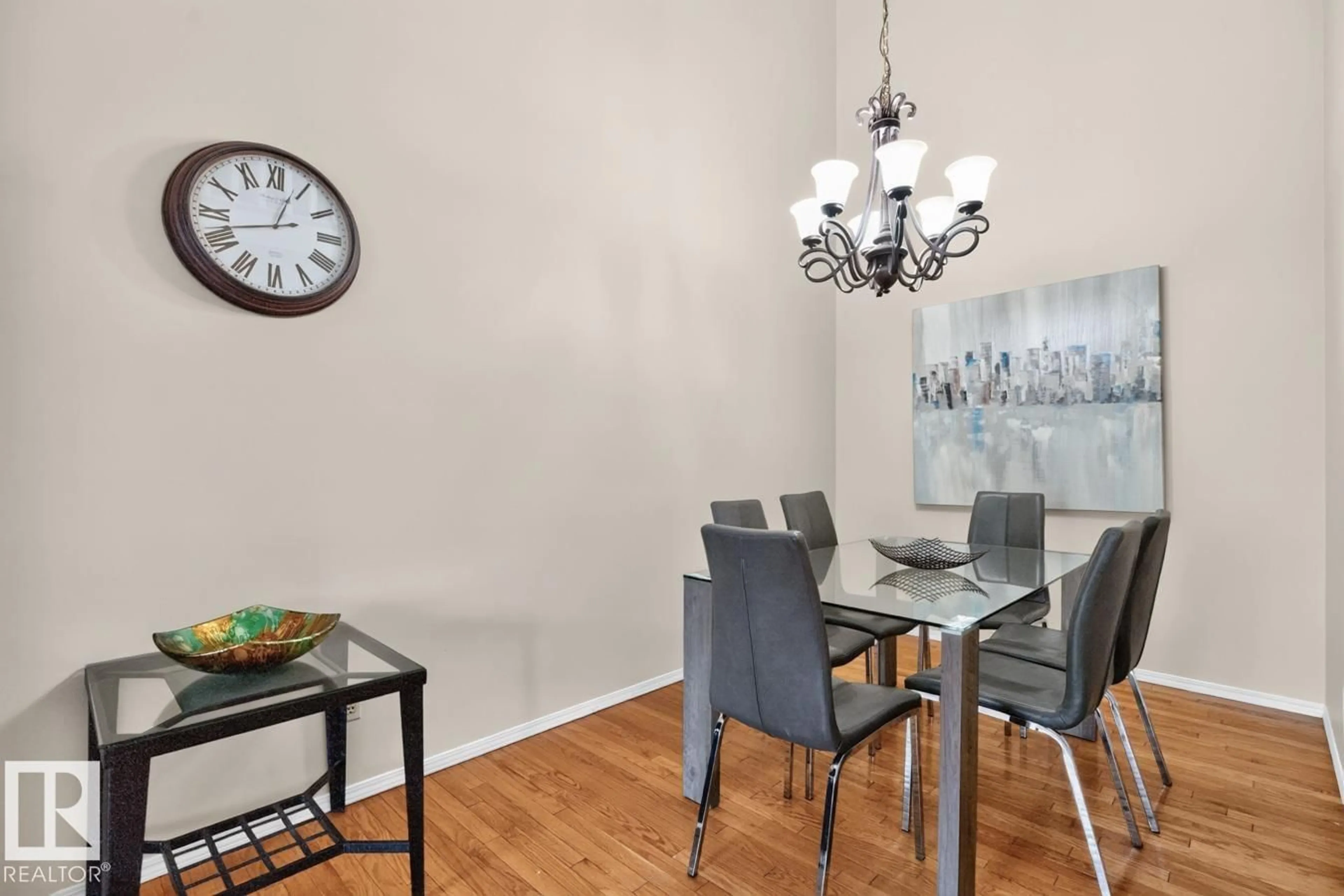 Dining room, wood/laminate floor for 421 - 4404 122 ST, Edmonton Alberta T6J4A9