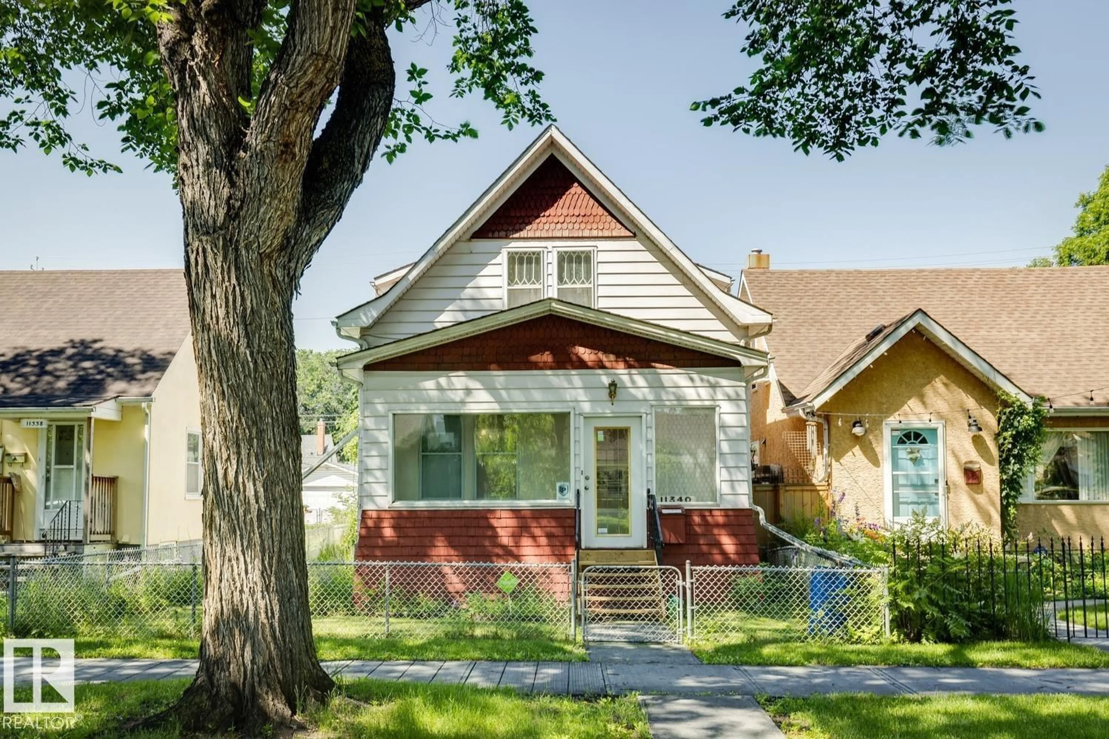 Home with brick exterior material, street for 11340 90 ST, Edmonton Alberta T5B3X5