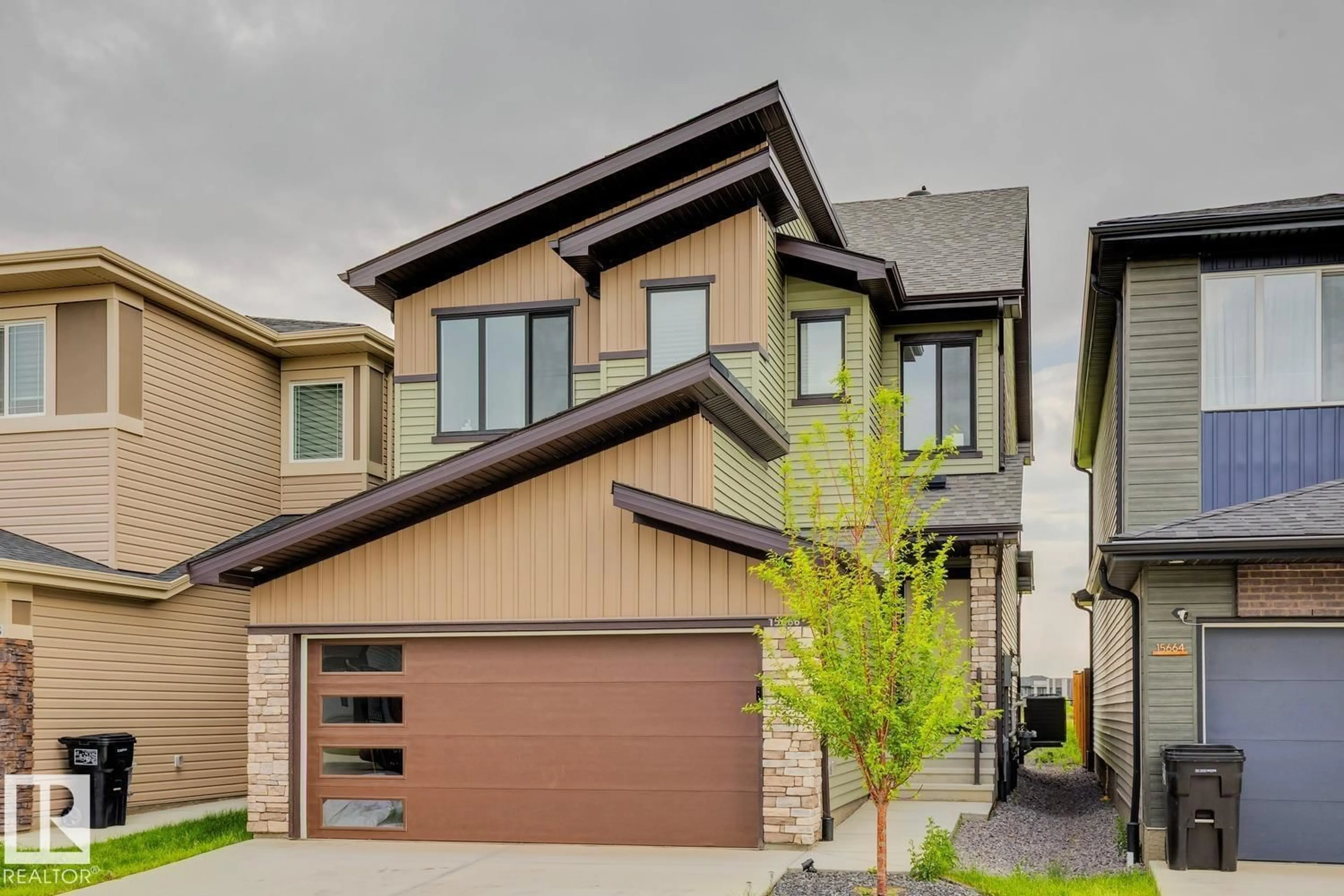 Home with brick exterior material, street for SW - 15666 18 AV, Edmonton Alberta T6W5C2