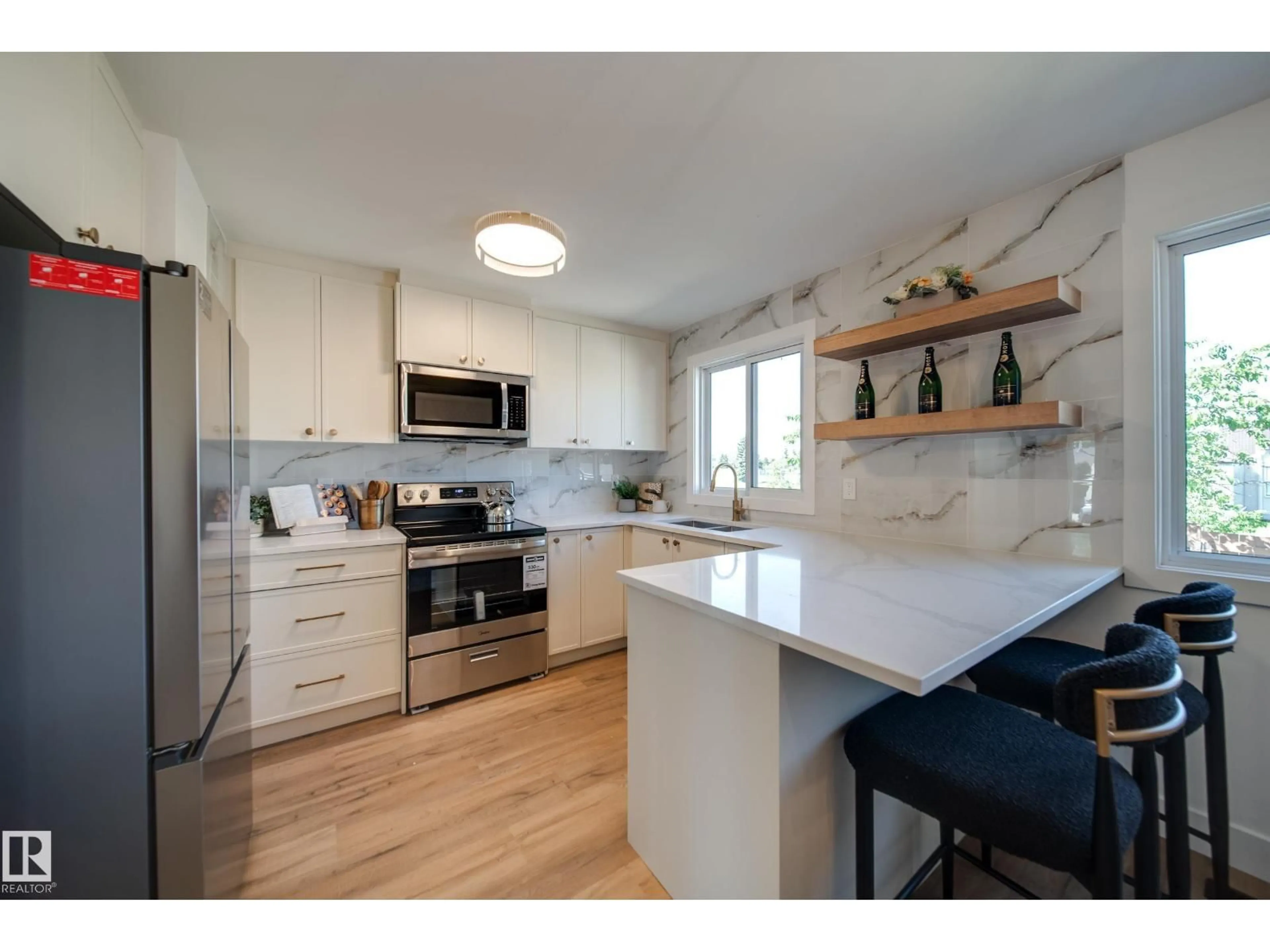 Open concept kitchen, unknown for 10343 172 AV, Edmonton Alberta T5X5C2