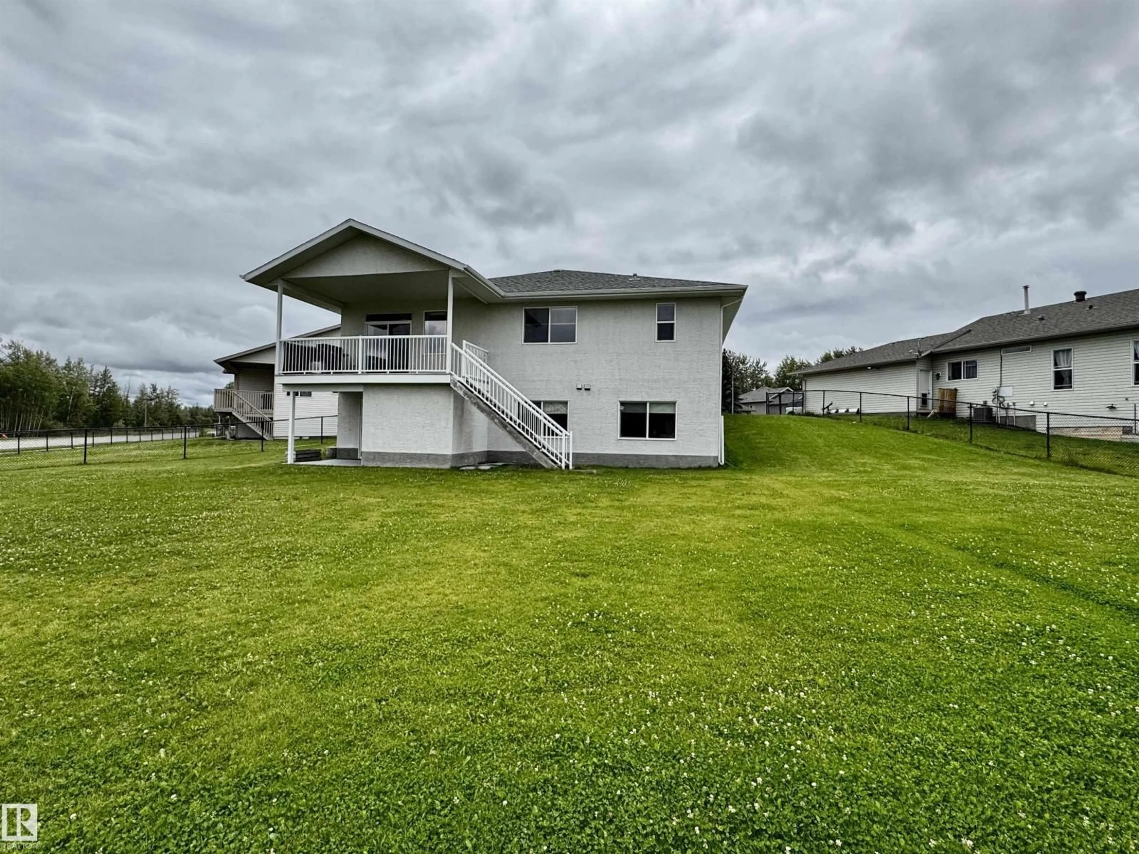 A pic from outside/outdoor area/front of a property/back of a property/a pic from drone, water/lake/river/ocean view for 3806 44A AV, Drayton Valley Alberta T7A1V9