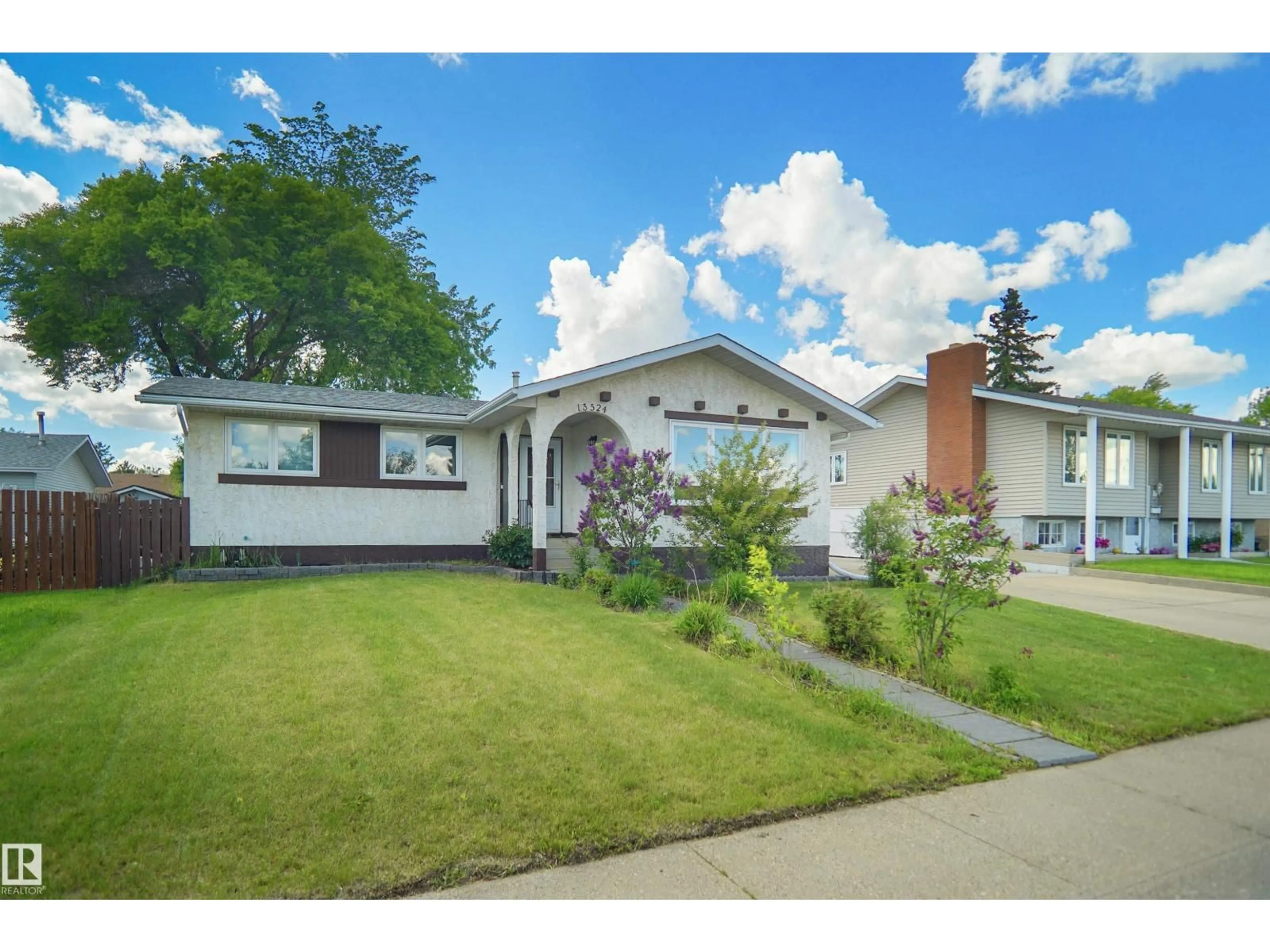 Home with vinyl exterior material, street for 13524 26 ST, Edmonton Alberta T5A3W1