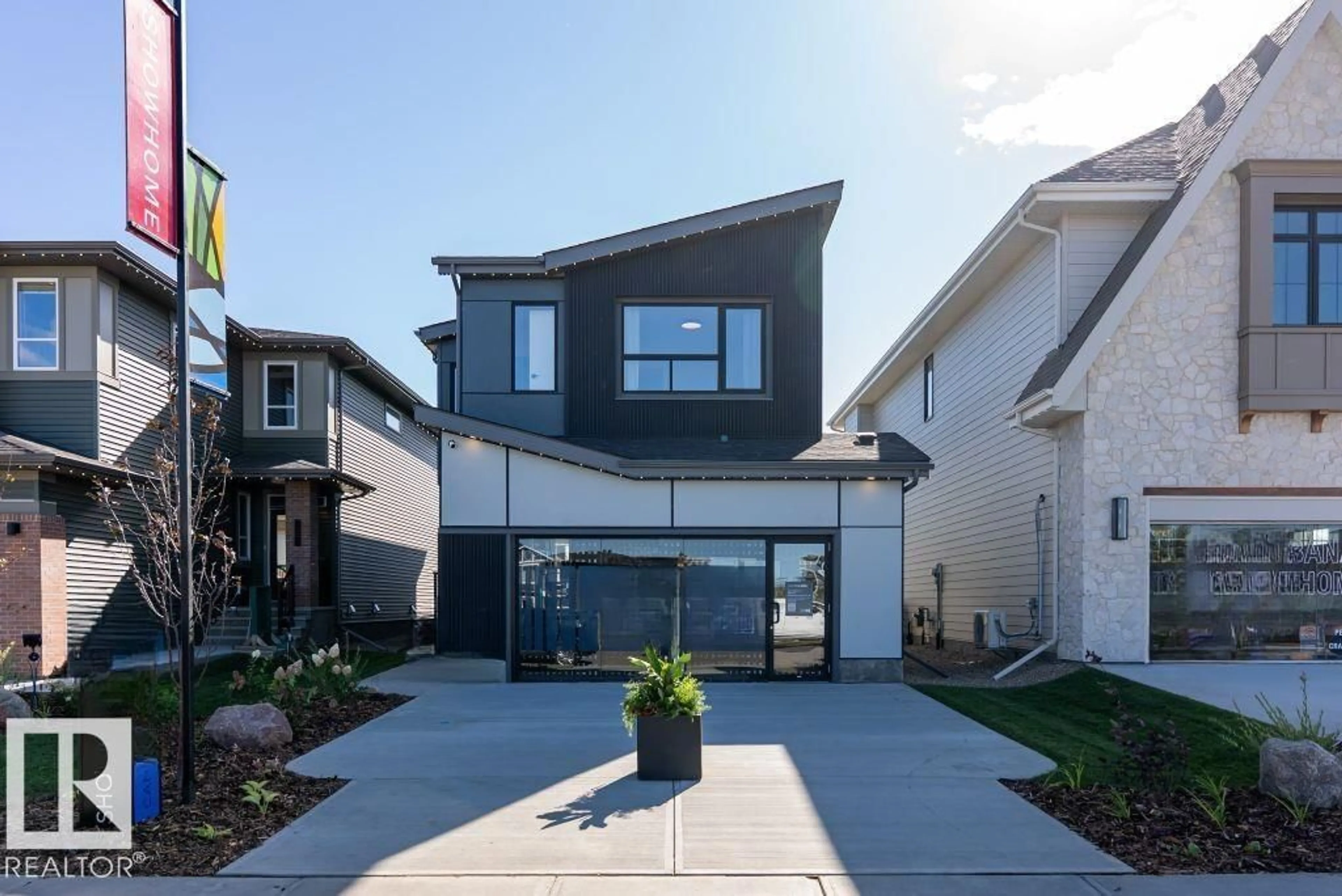 Home with vinyl exterior material, street for 1562 KESWICK DR, Edmonton Alberta T6W5R8