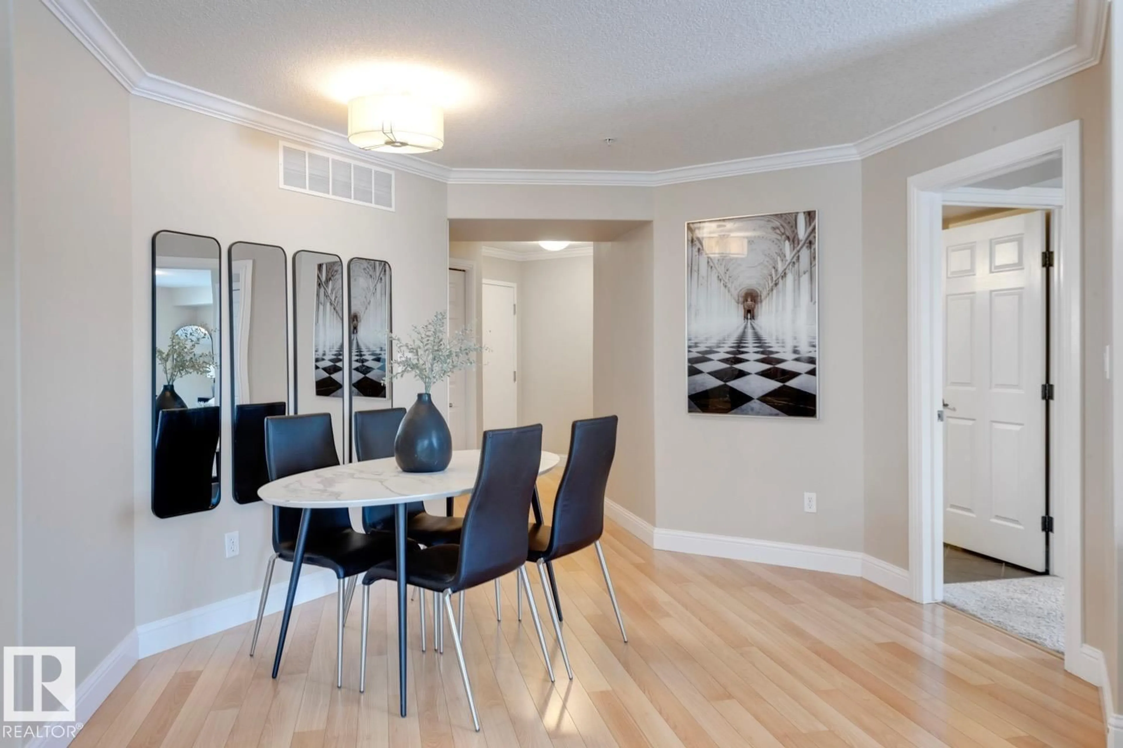 Dining room, wood/laminate floor for 207 - 14612 125 ST, Edmonton Alberta T5X0B6