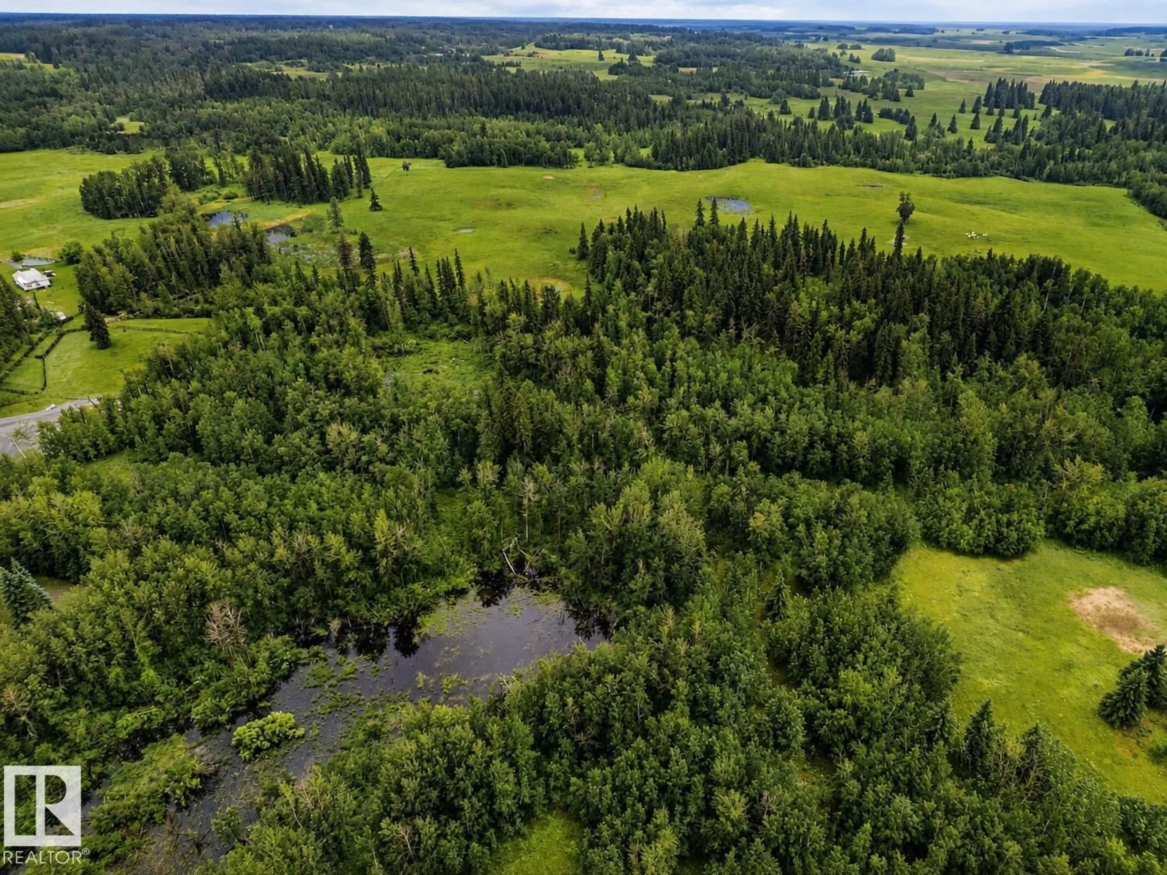 A pic from outside/outdoor area/front of a property/back of a property/a pic from drone, forest/trees view for 20519 TWP ROAD 550, Rural Strathcona County Alberta T8L4B6