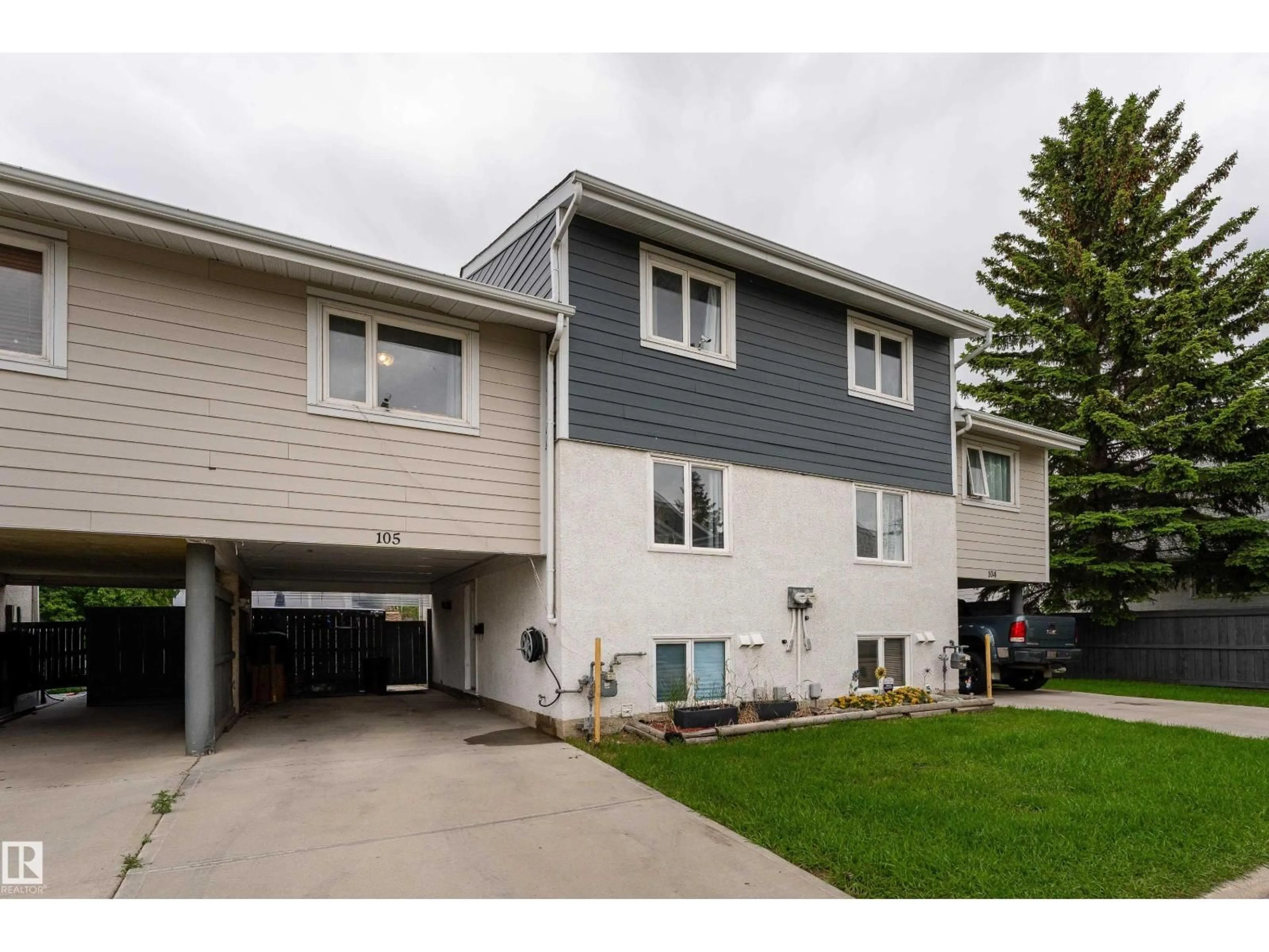 Home with vinyl exterior material, street for 105 CALLINGWOOD TWO NW, Edmonton Alberta T5T1A3