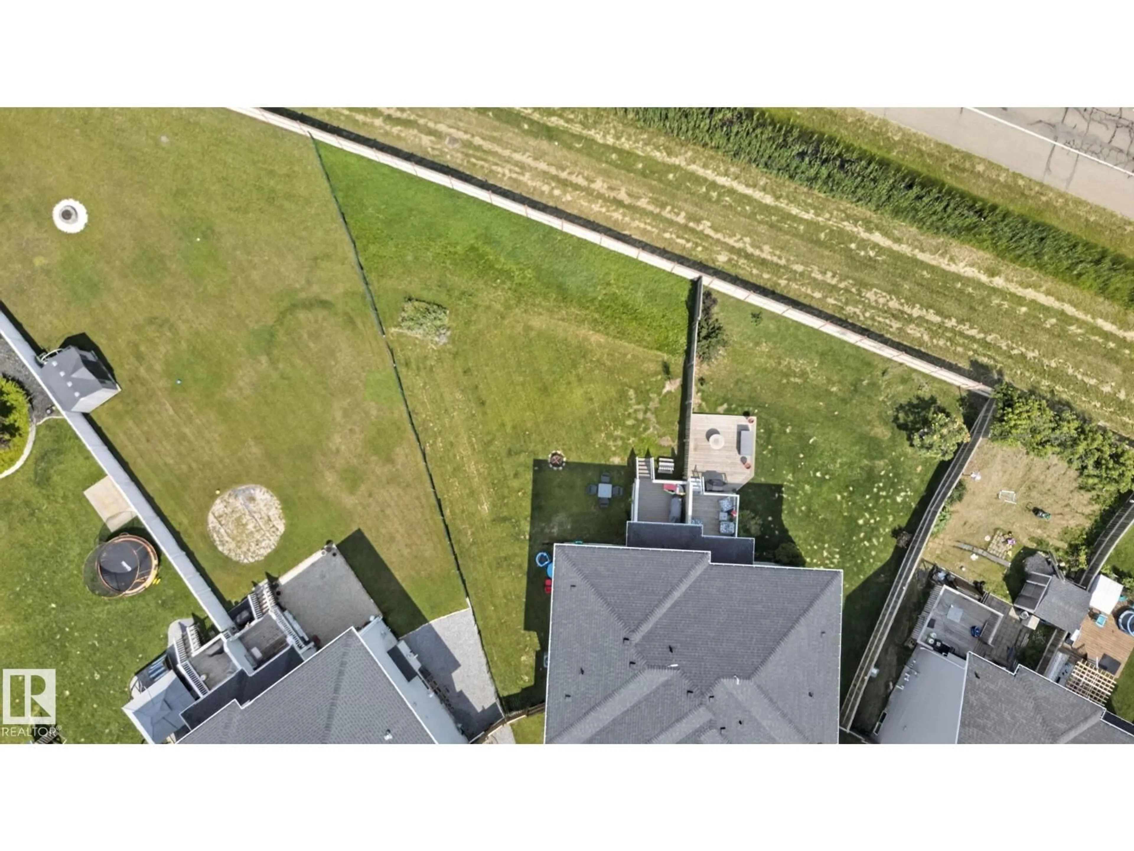 A pic from outside/outdoor area/front of a property/back of a property/a pic from drone, unknown for 385 SIMMONDS WY, Leduc Alberta T9E0Y9