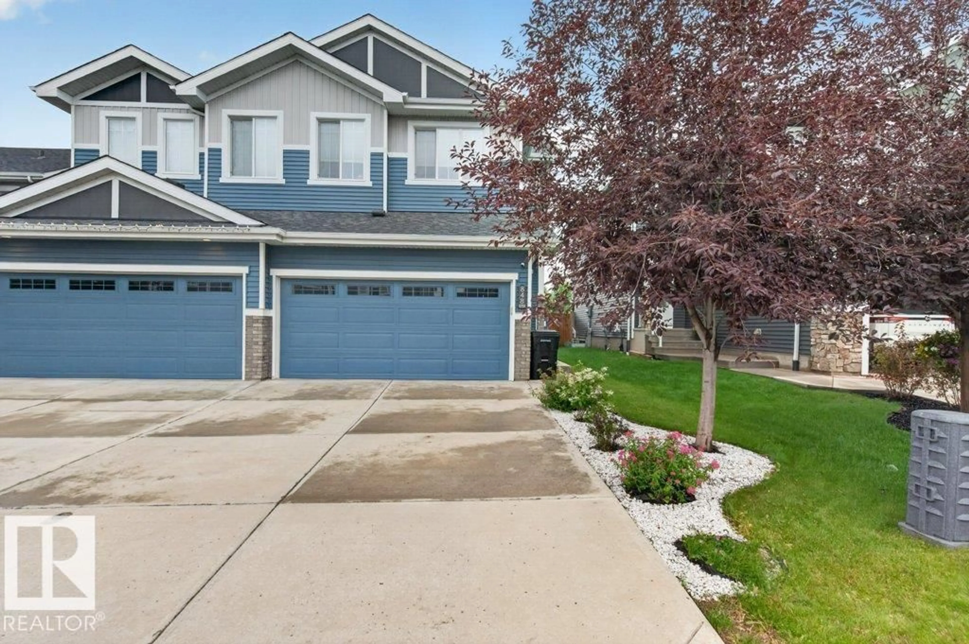 Home with vinyl exterior material, street for 848 EBBERS CR, Edmonton Alberta T5Y3B2
