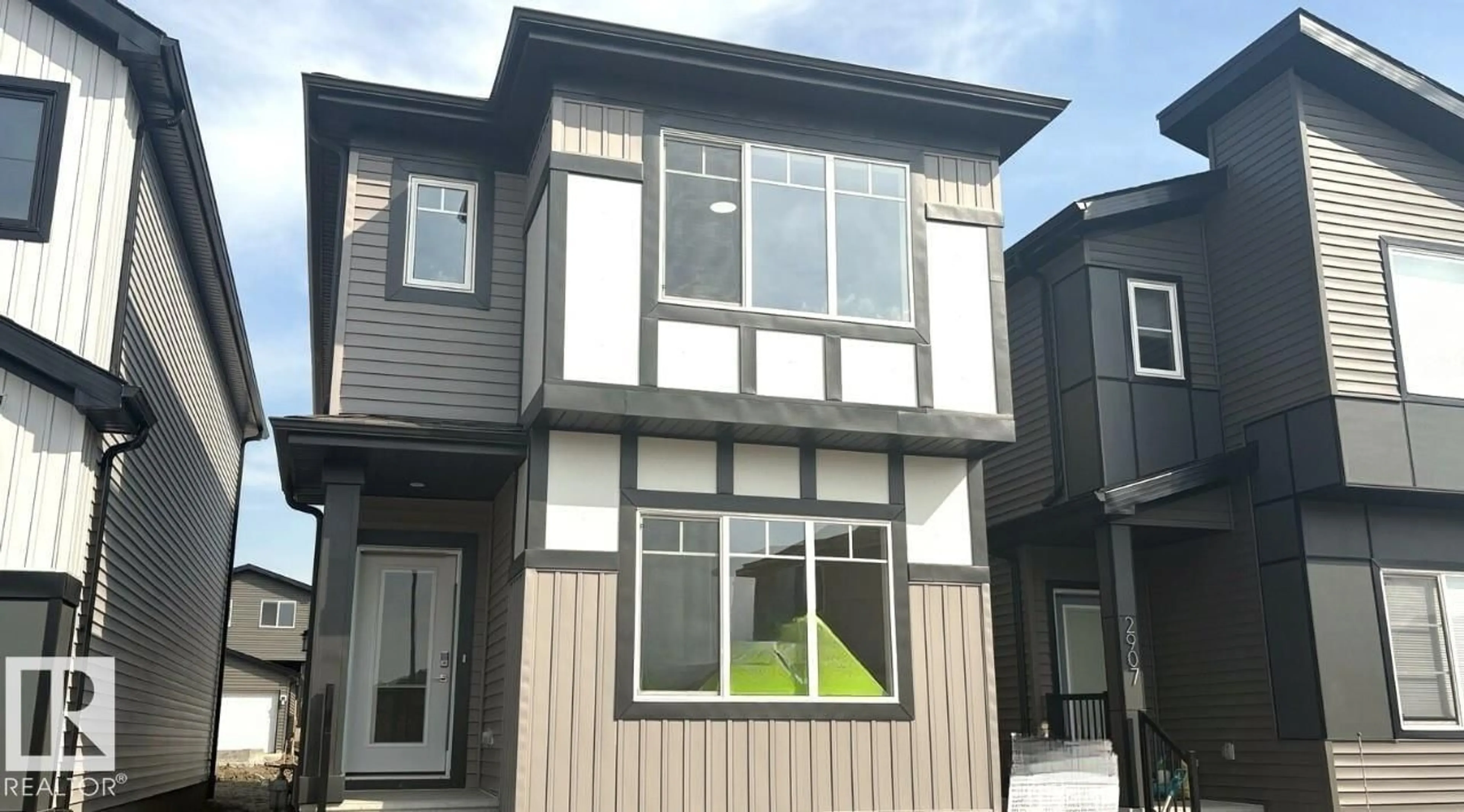 Home with vinyl exterior material, street for 2903 64 ST, Edmonton Alberta T6X3M8