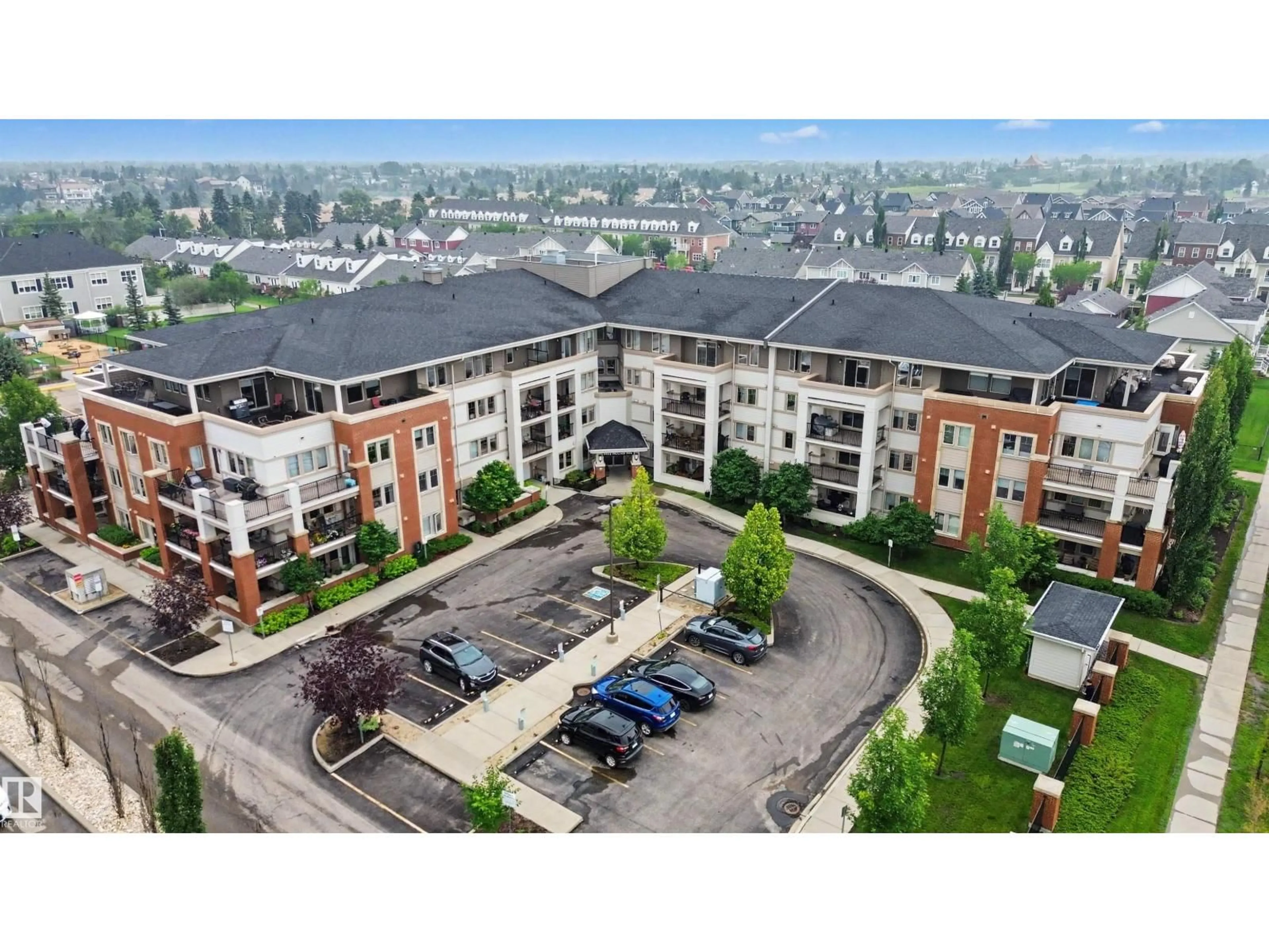 A pic from outside/outdoor area/front of a property/back of a property/a pic from drone, building for 215 - 4450 MCCRAE AV, Edmonton Alberta T5E6S4