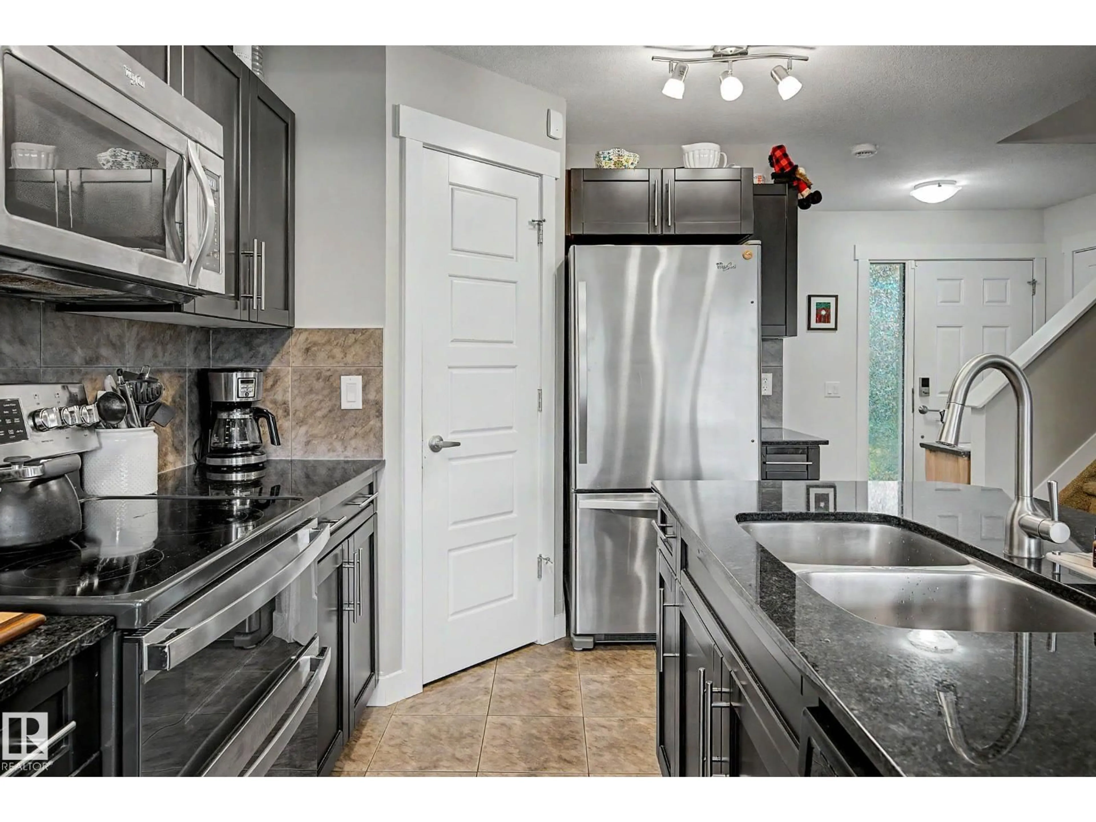 Standard kitchen, ceramic/tile floor for 9436 230 ST, Edmonton Alberta T5T7B5