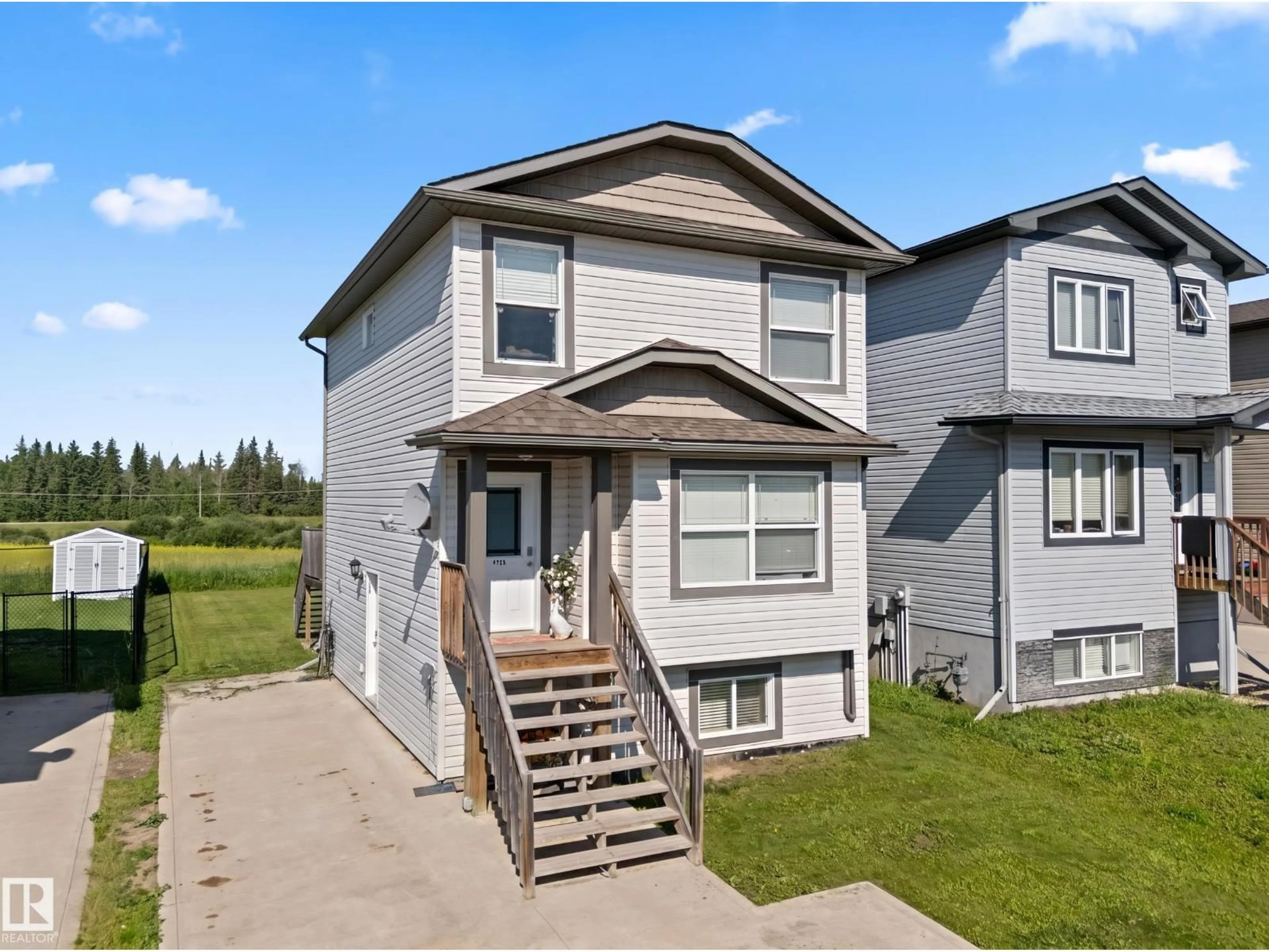 Home with vinyl exterior material, street for 110 26 ST, Cold Lake Alberta T9M0E3