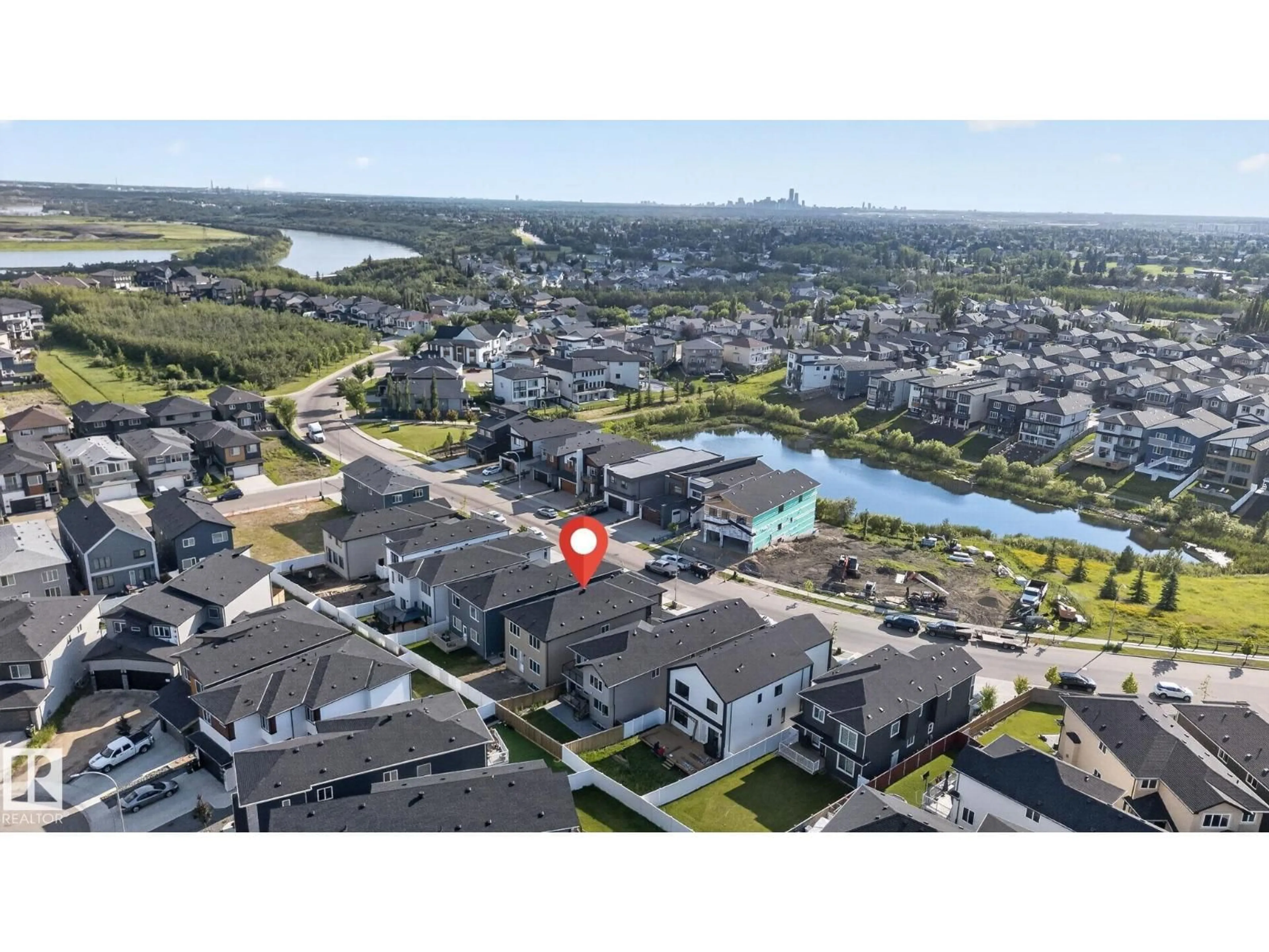A pic from outside/outdoor area/front of a property/back of a property/a pic from drone, water/lake/river/ocean view for 213 FRASER WY, Edmonton Alberta T5Y4C1