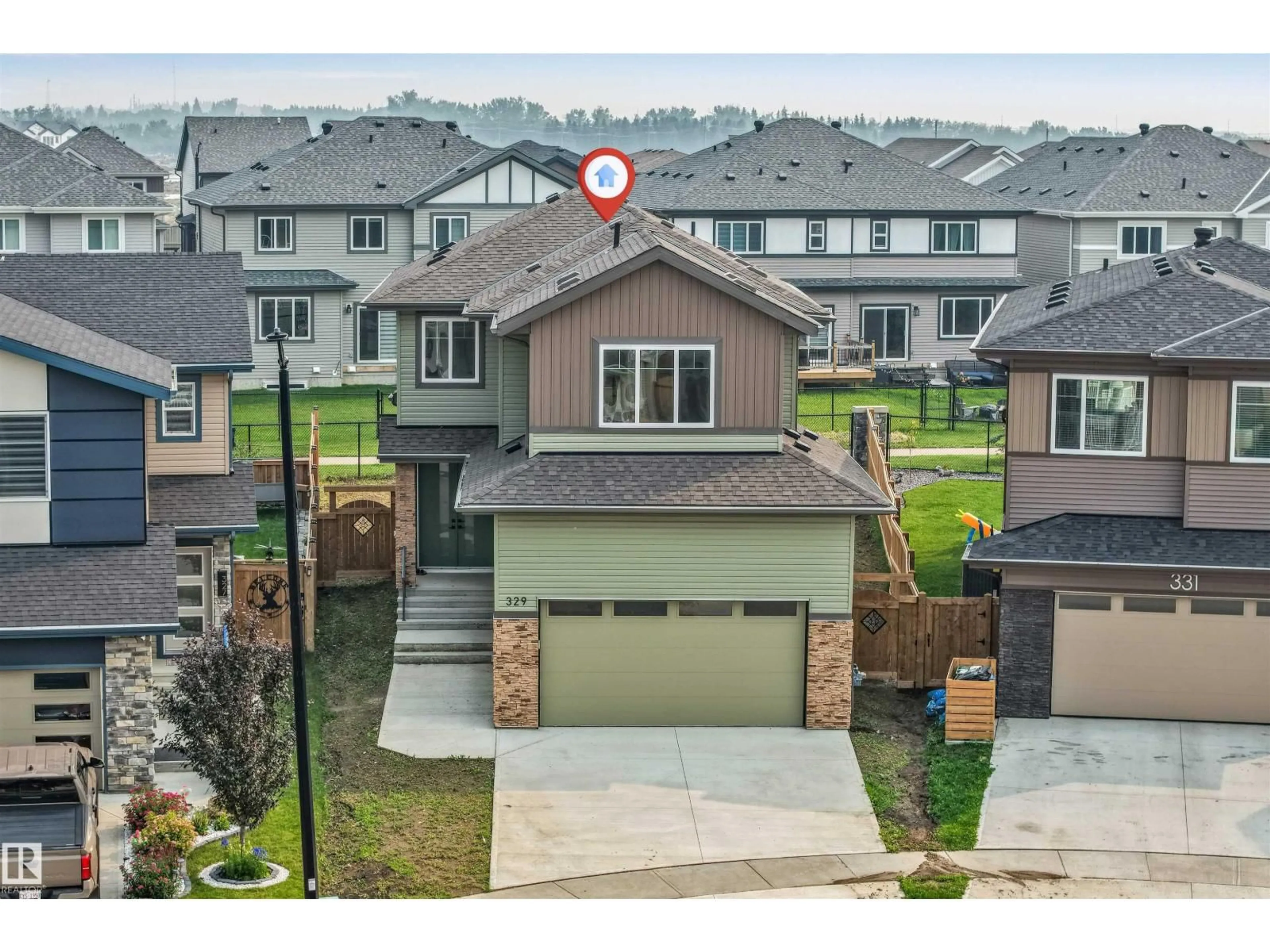 A pic from outside/outdoor area/front of a property/back of a property/a pic from drone, street for 329 BALSAM LI, Leduc Alberta T9E1L2