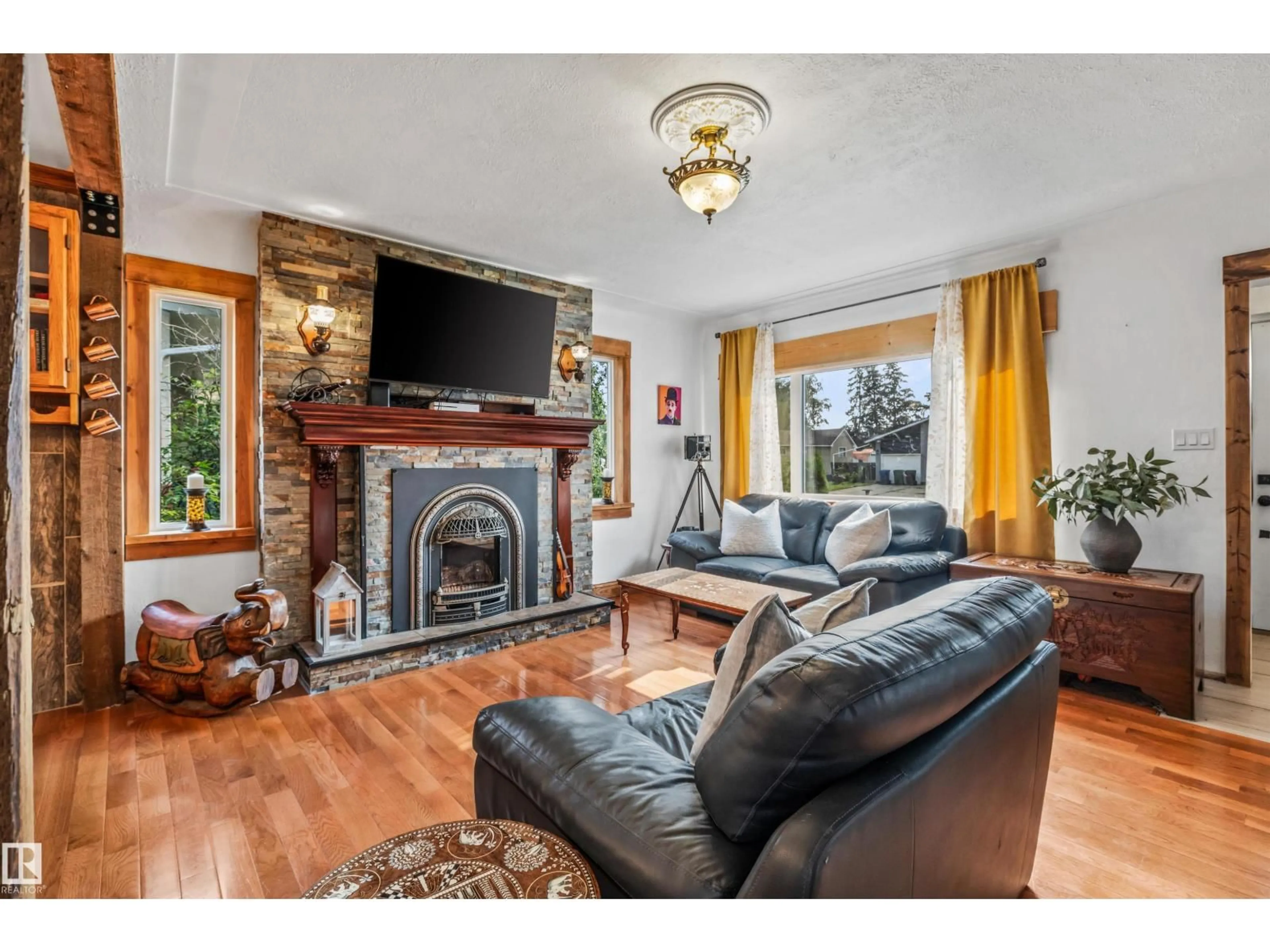 Living room with furniture, wood/laminate floor for 4917 50 ST, Bruderheim Alberta T0B0S0