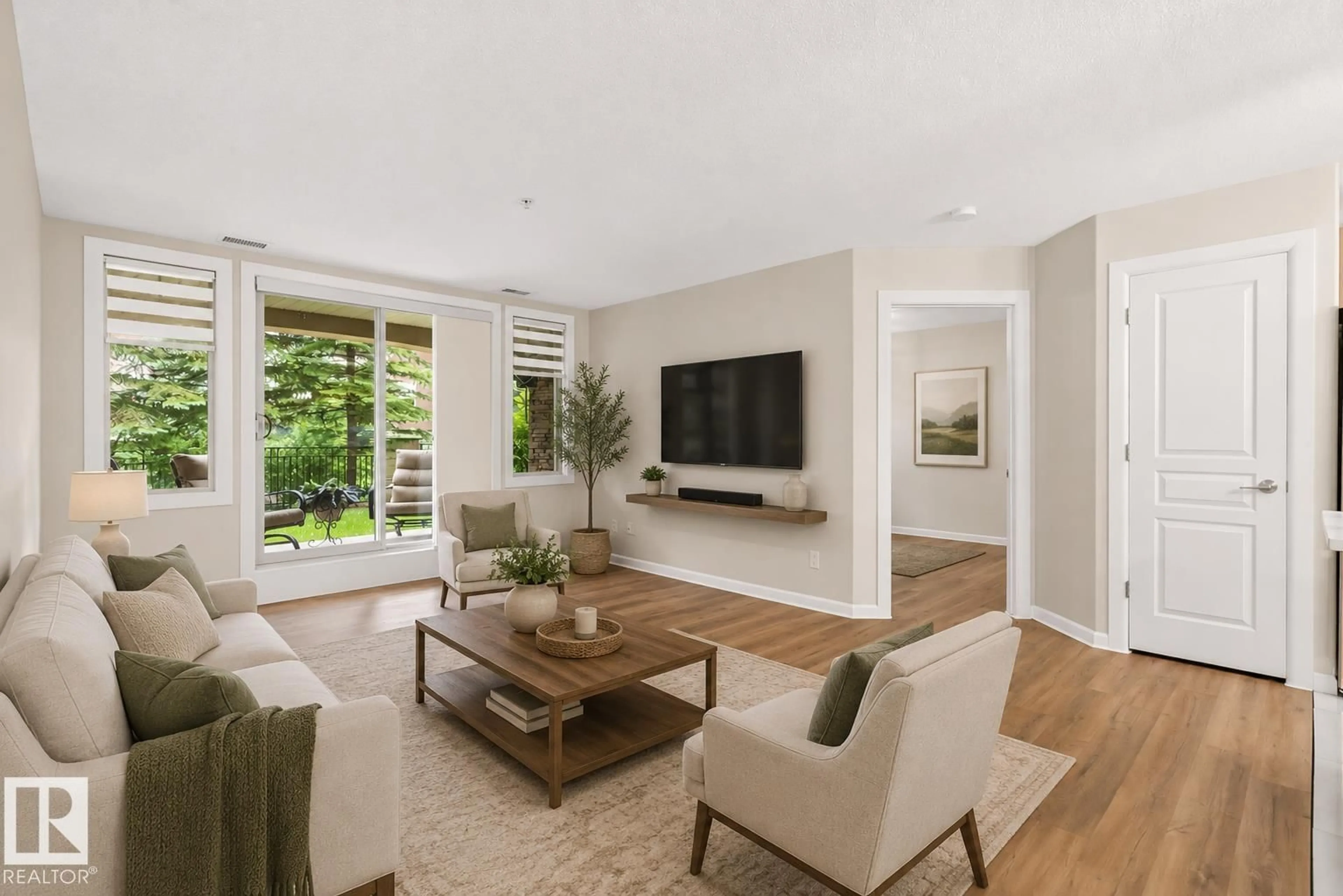 Living room with furniture, unknown for #108 - 400 PALISADES WY, Sherwood Park Alberta T8H0H4