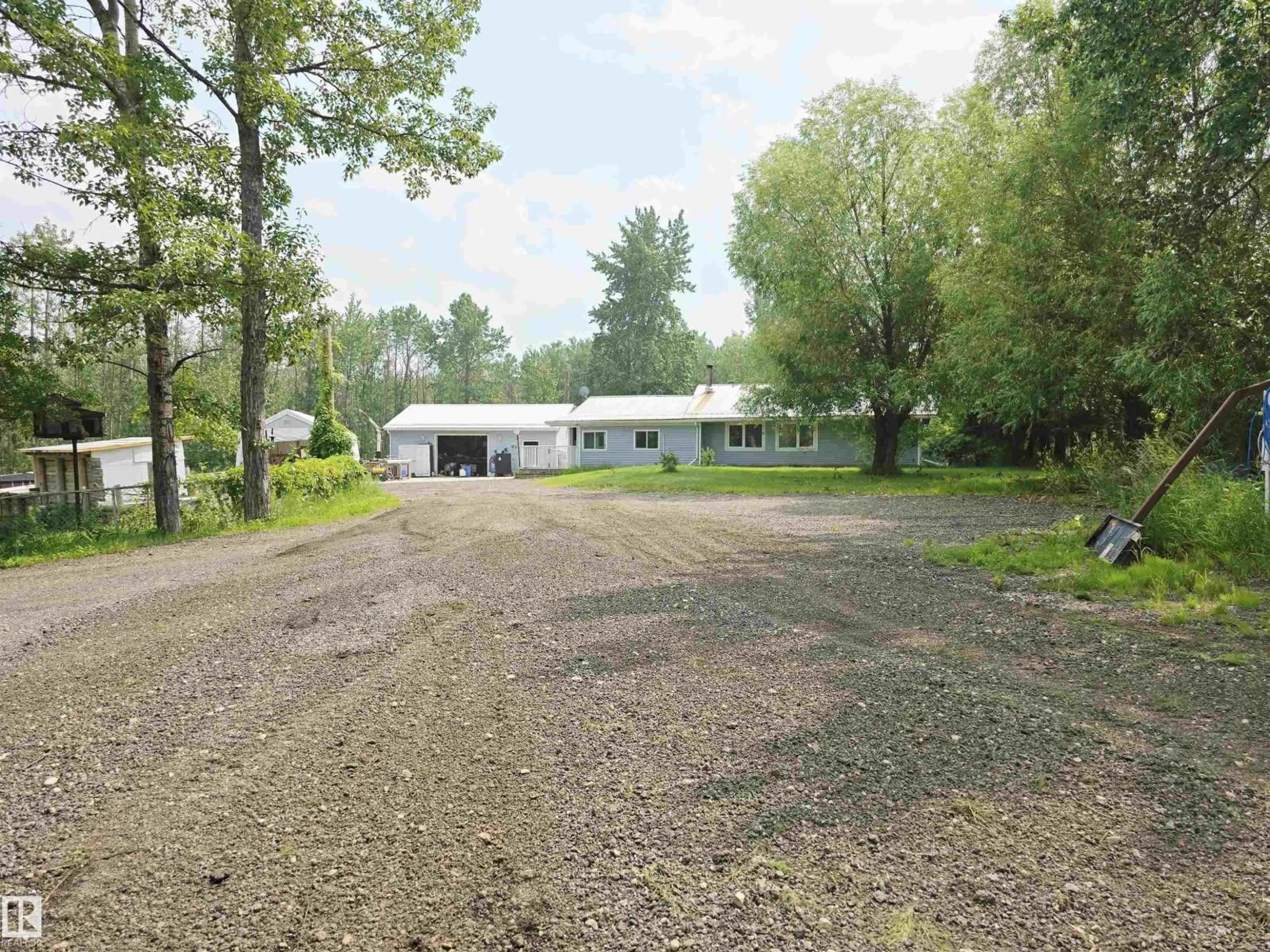 A pic from outside/outdoor area/front of a property/back of a property/a pic from drone, unknown for 53319 - 308 RGE ROAD 31, Rural Parkland County Alberta T7Y0E3