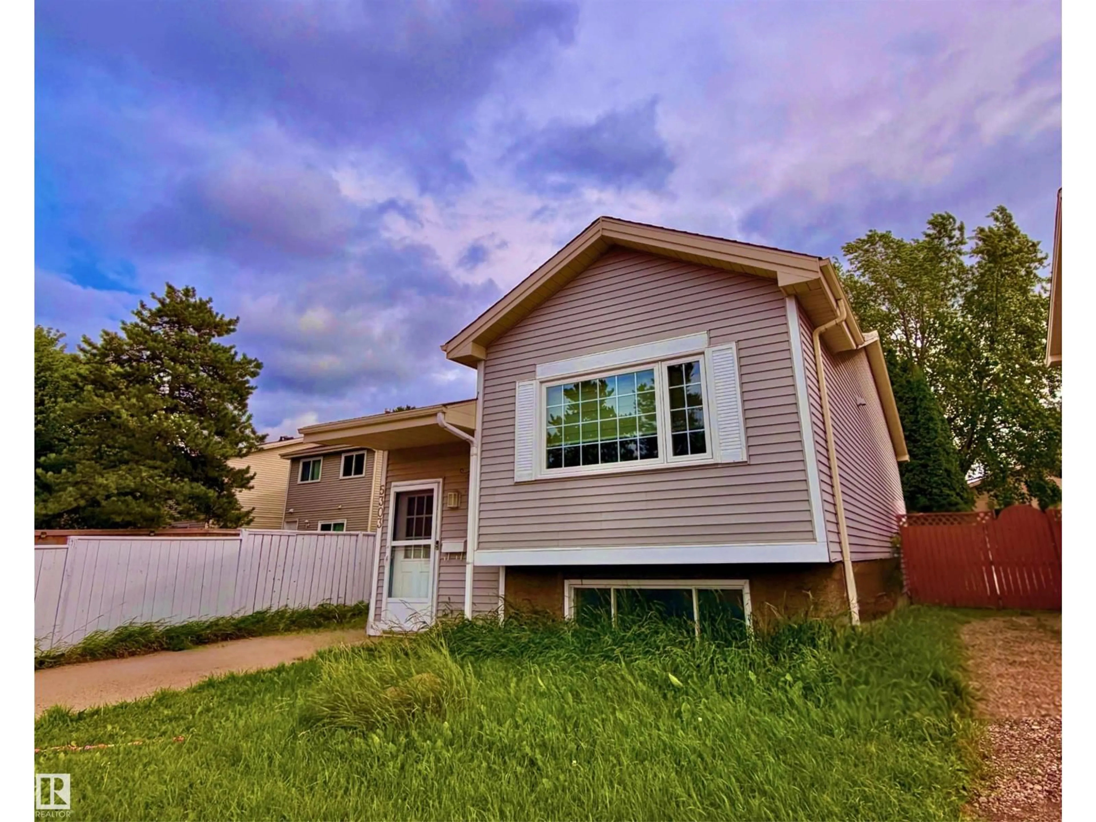 Home with vinyl exterior material, street for 5303 21 AV, Edmonton Alberta T6L5G5