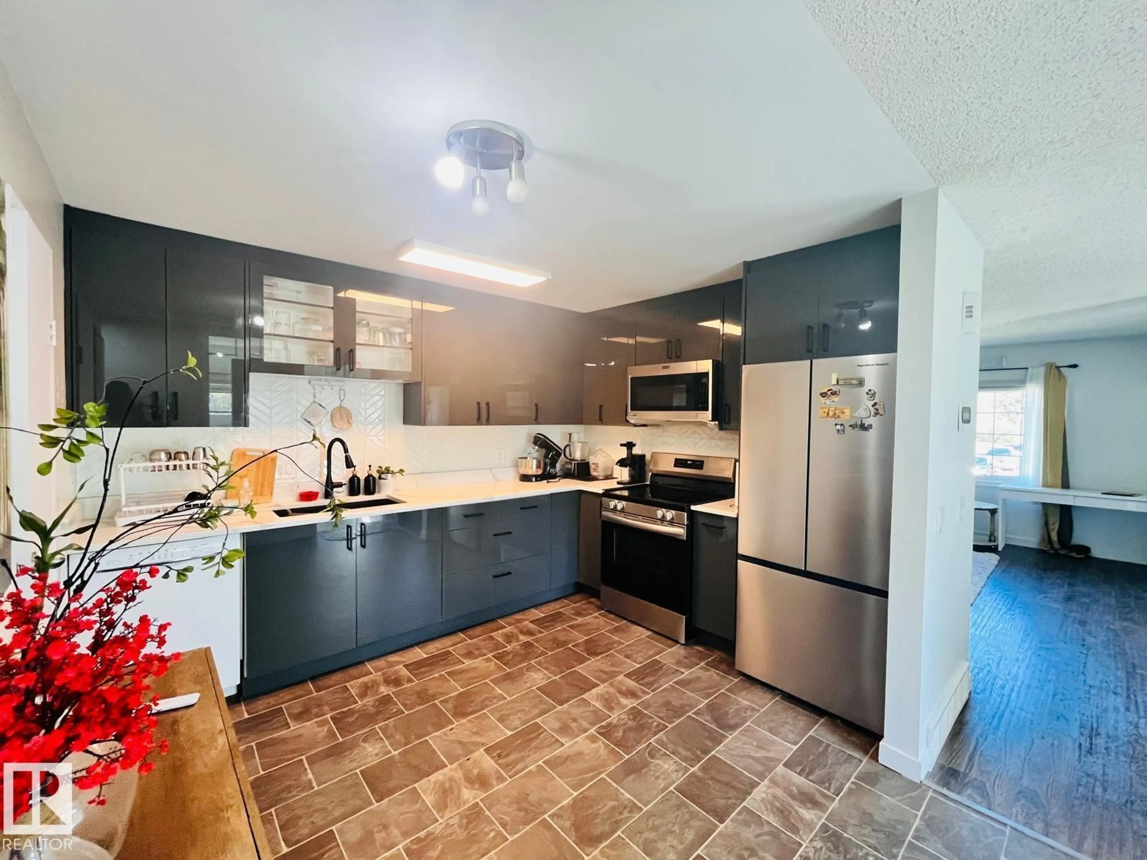 Open concept kitchen, ceramic/tile floor for 5303 21 AV, Edmonton Alberta T6L5G5