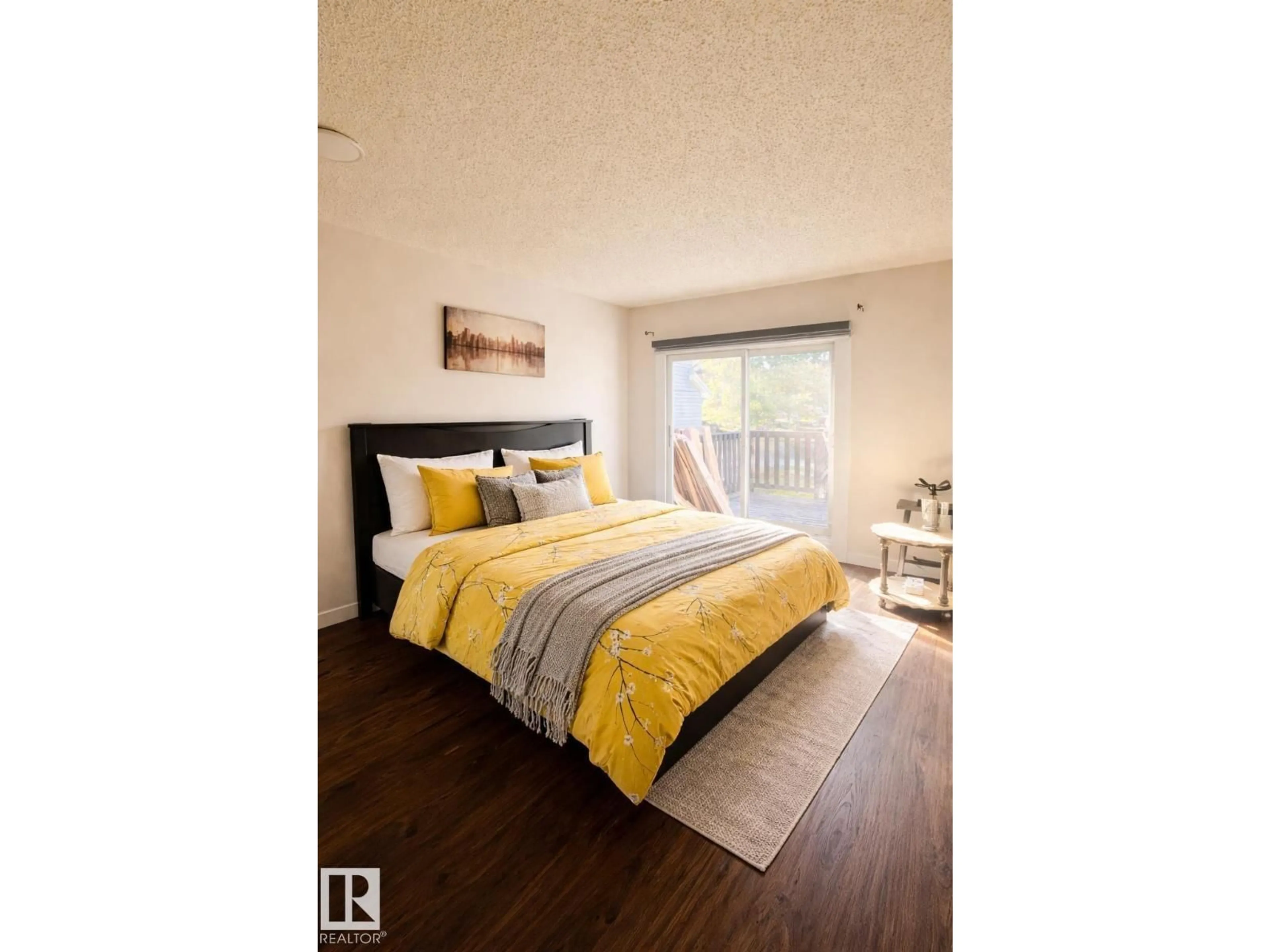 Bedroom with bed, wood/laminate floor for 5303 21 AV, Edmonton Alberta T6L5G5
