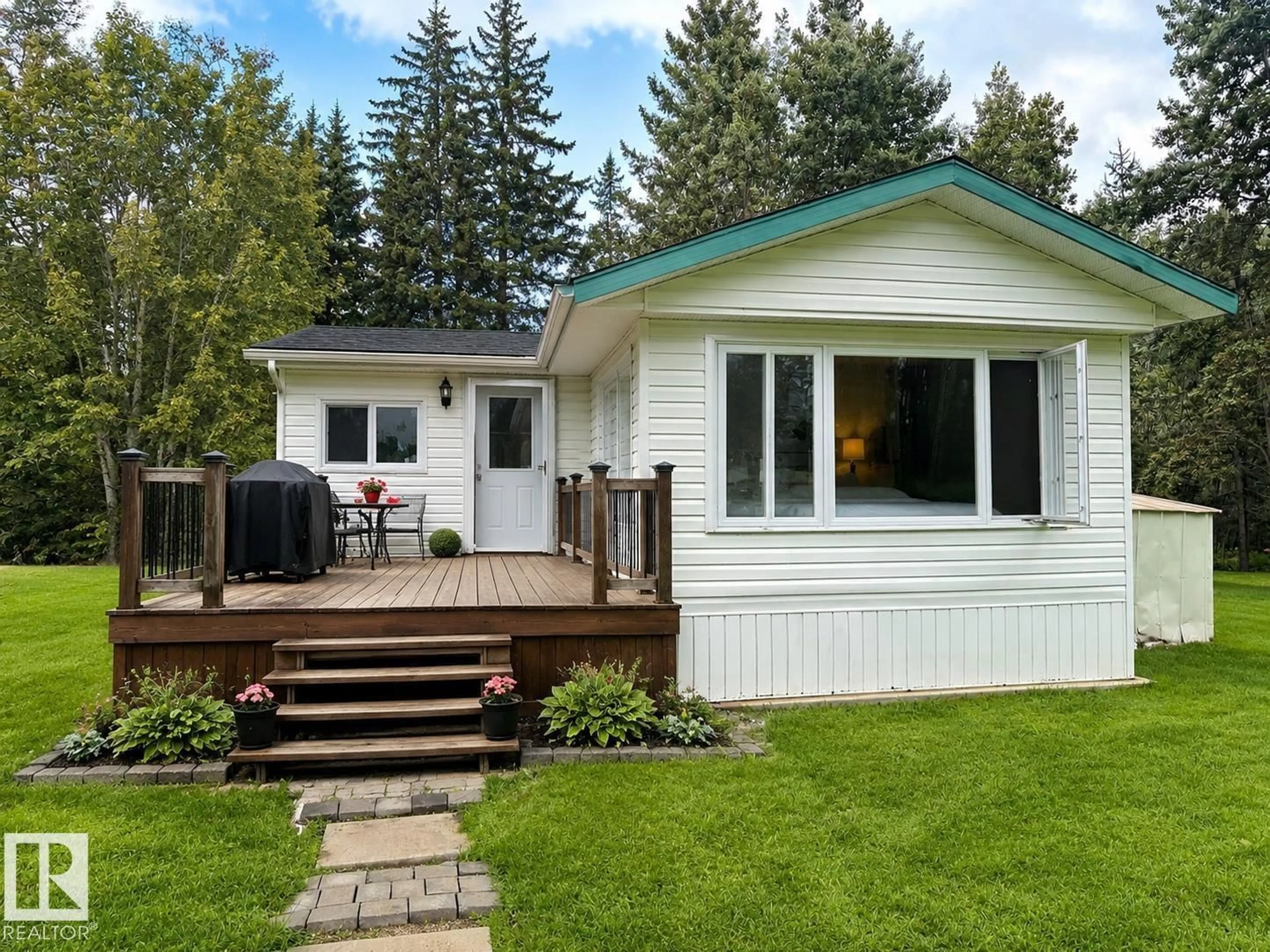 Home with vinyl exterior material, street for 50514 - 126 RANGE ROAD 202, Rural Beaver County Alberta T0B4J2
