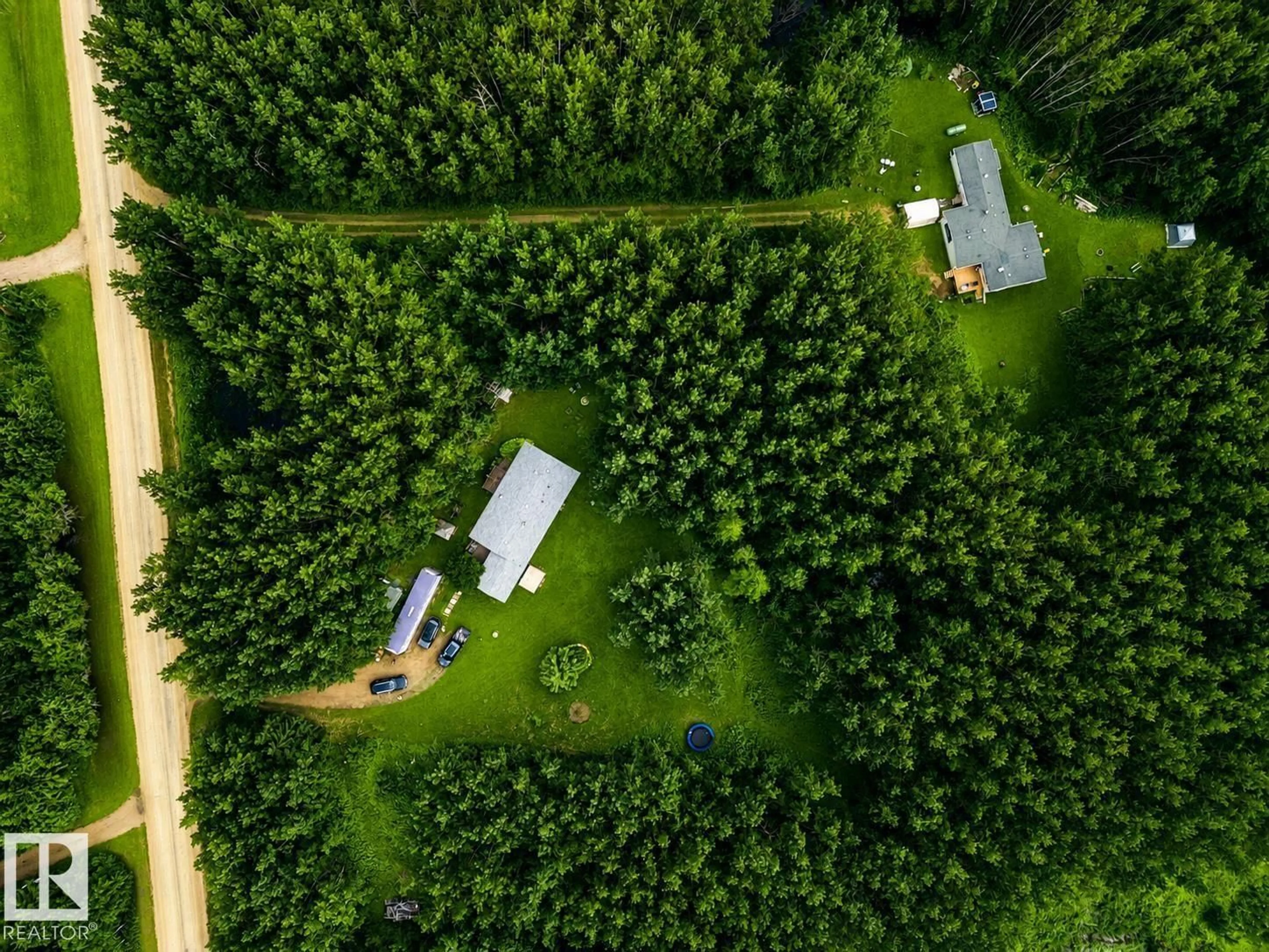 A pic from outside/outdoor area/front of a property/back of a property/a pic from drone, forest/trees view for 50514 - 126 RANGE ROAD 202, Rural Beaver County Alberta T0B4J2