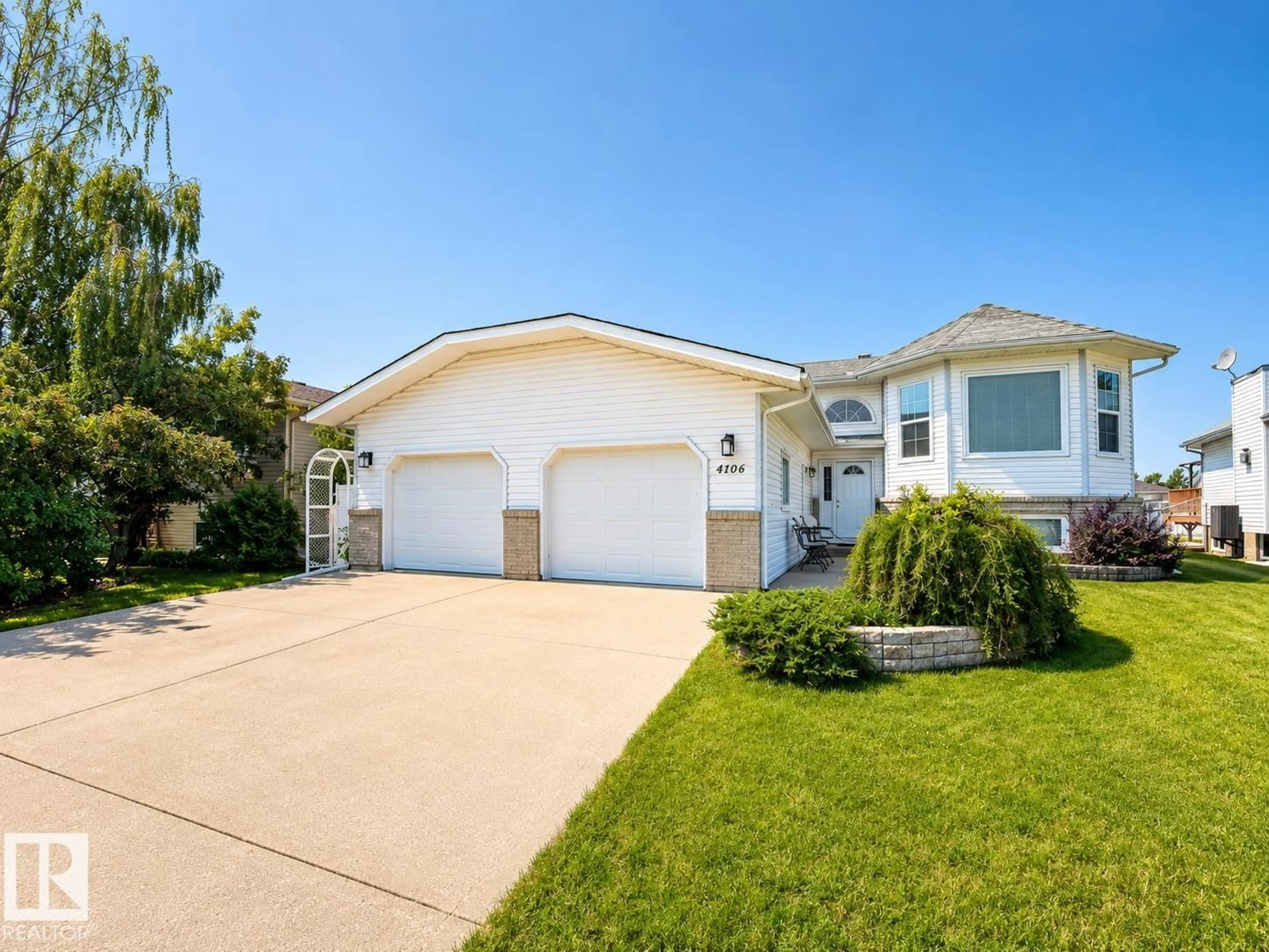 Home with vinyl exterior material, street for 4106 39A ST, Bonnyville Town Alberta T9N1V5