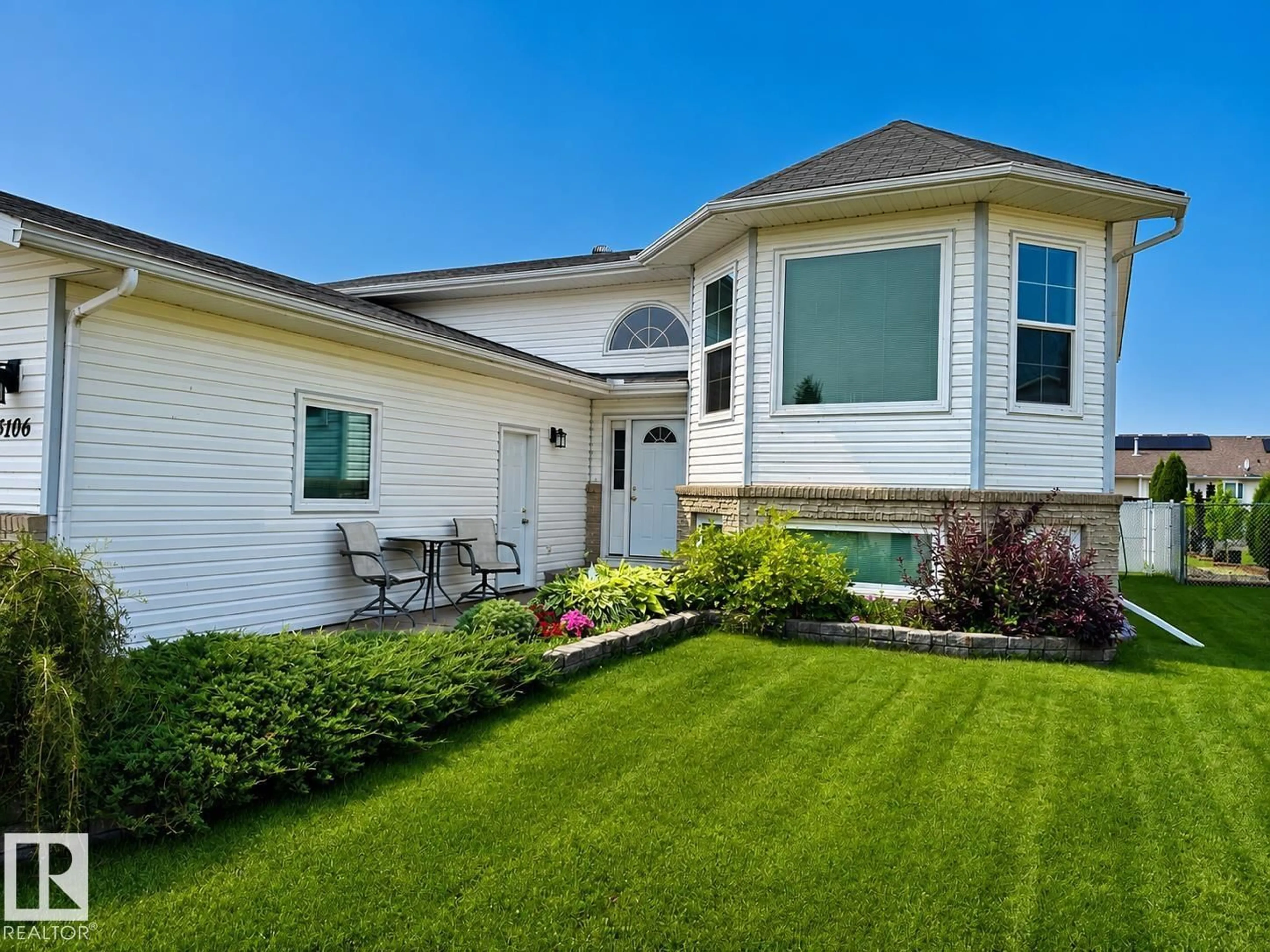 Home with vinyl exterior material, street for 4106 39A ST, Bonnyville Town Alberta T9N1V5