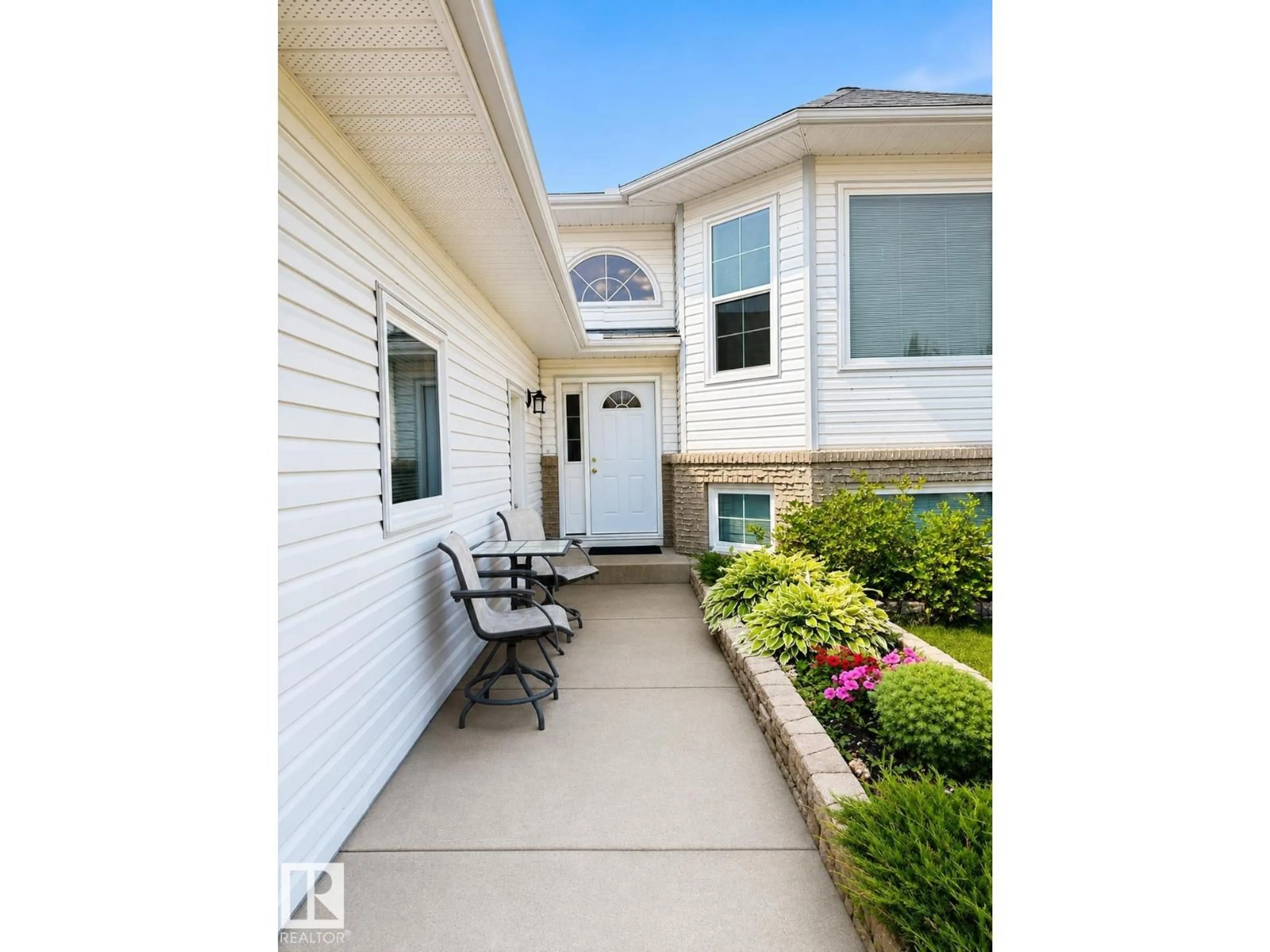Home with vinyl exterior material, street for 4106 39A ST, Bonnyville Town Alberta T9N1V5