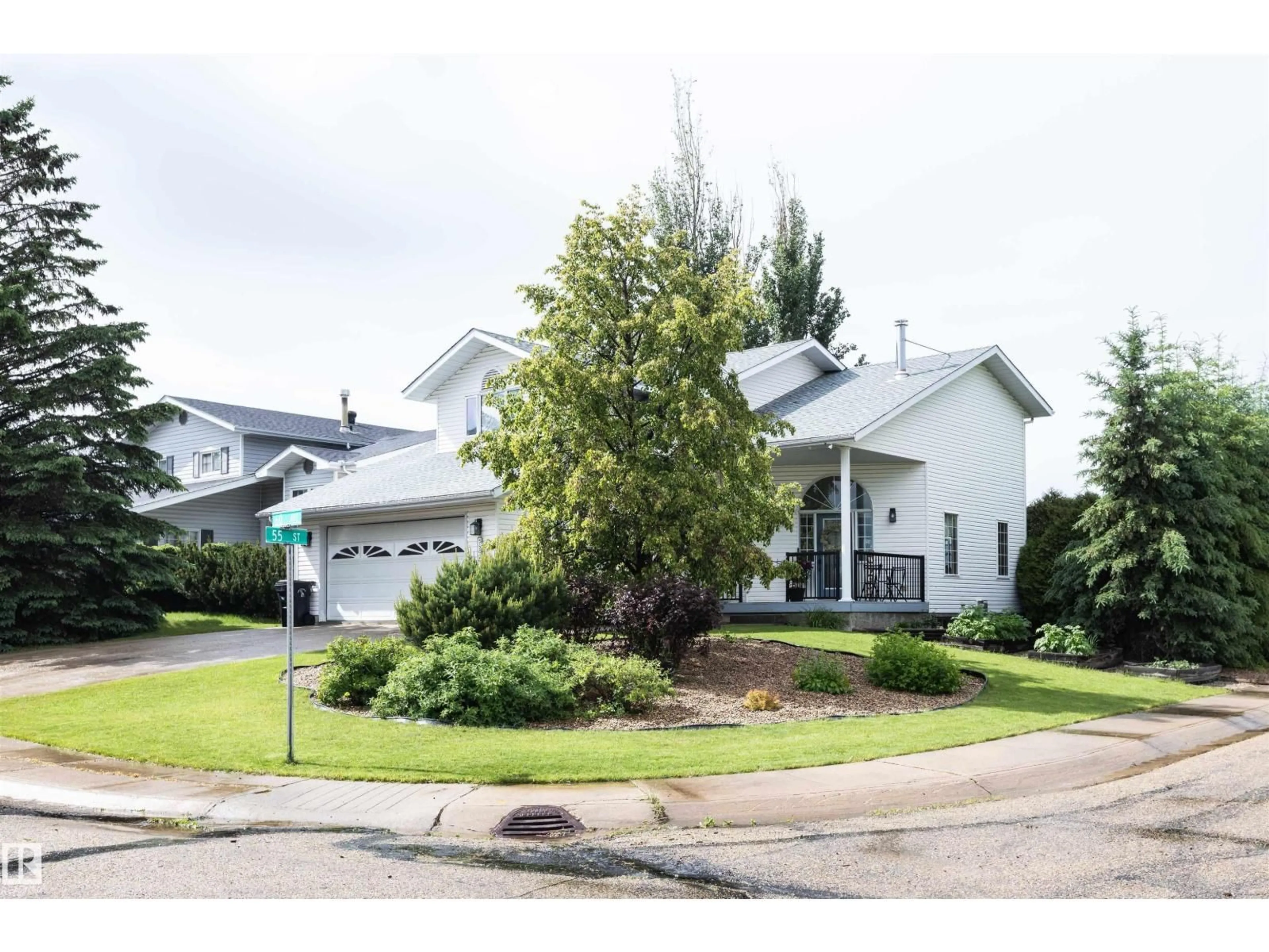 Home with vinyl exterior material, street for 5502 60 AV, Barrhead Alberta T7N1E1